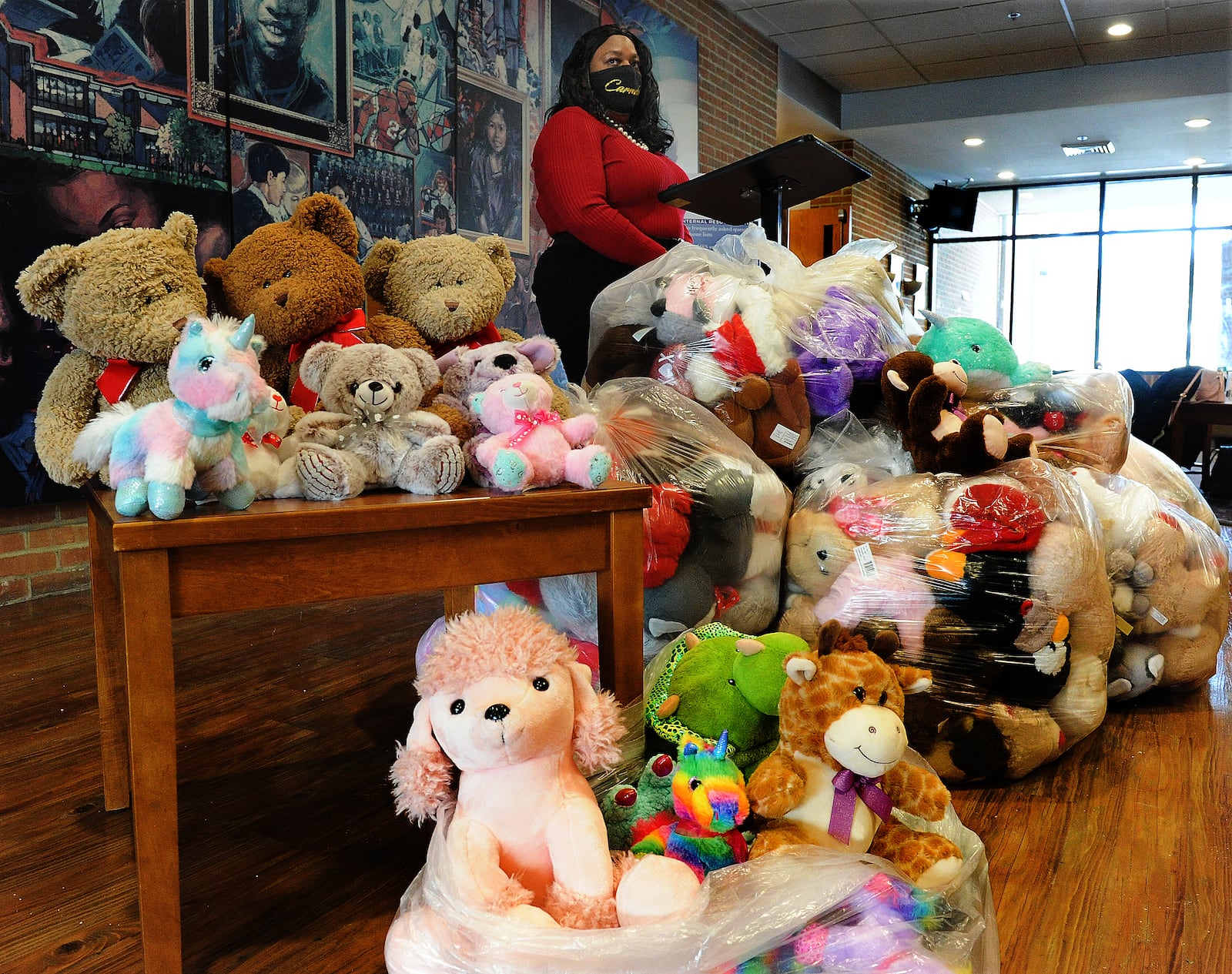 Dr. Carmela Daniels, President National Council of Negro Women, and the Dayton section of NCNW donated over 300 stuffed toys to Montgomery County Children Services on Valentine's Day, Feb. 14, 2022. MARSHHALL GORBY\STAFF