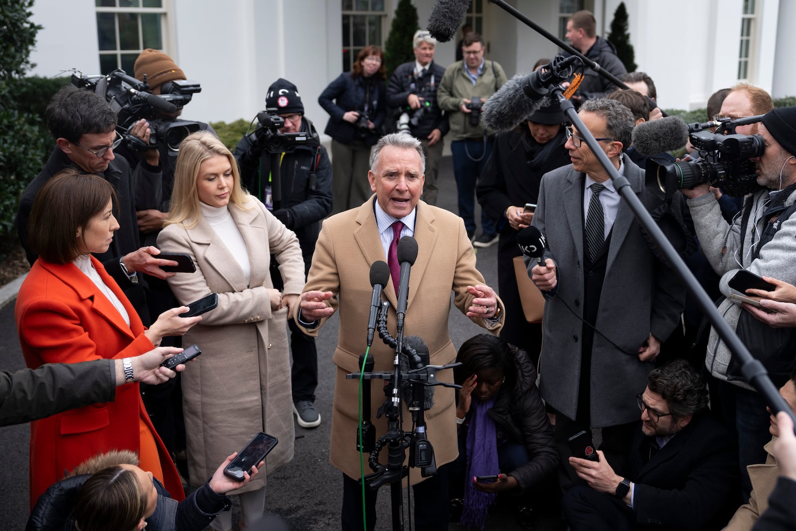 Steve Witkoff, White House special envoy for the Middle East, center, accompanied by White House press secretary Karoline Leavitt, speaks with reporters at the White House in Washington, Thursday, March 6, 2025. (AP Photo/Ben Curtis)