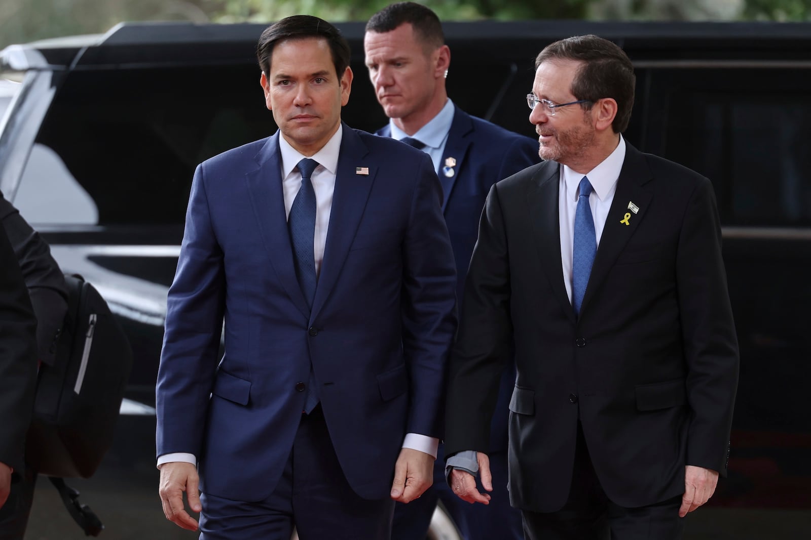 U.S. Secretary of State Marco Rubio, left, meets with Israeli president Isaac Herzog, right, in Jerusalem, Israel, Sunday Feb. 16, 2025. (Abir Sultan/Pool Photo via AP)