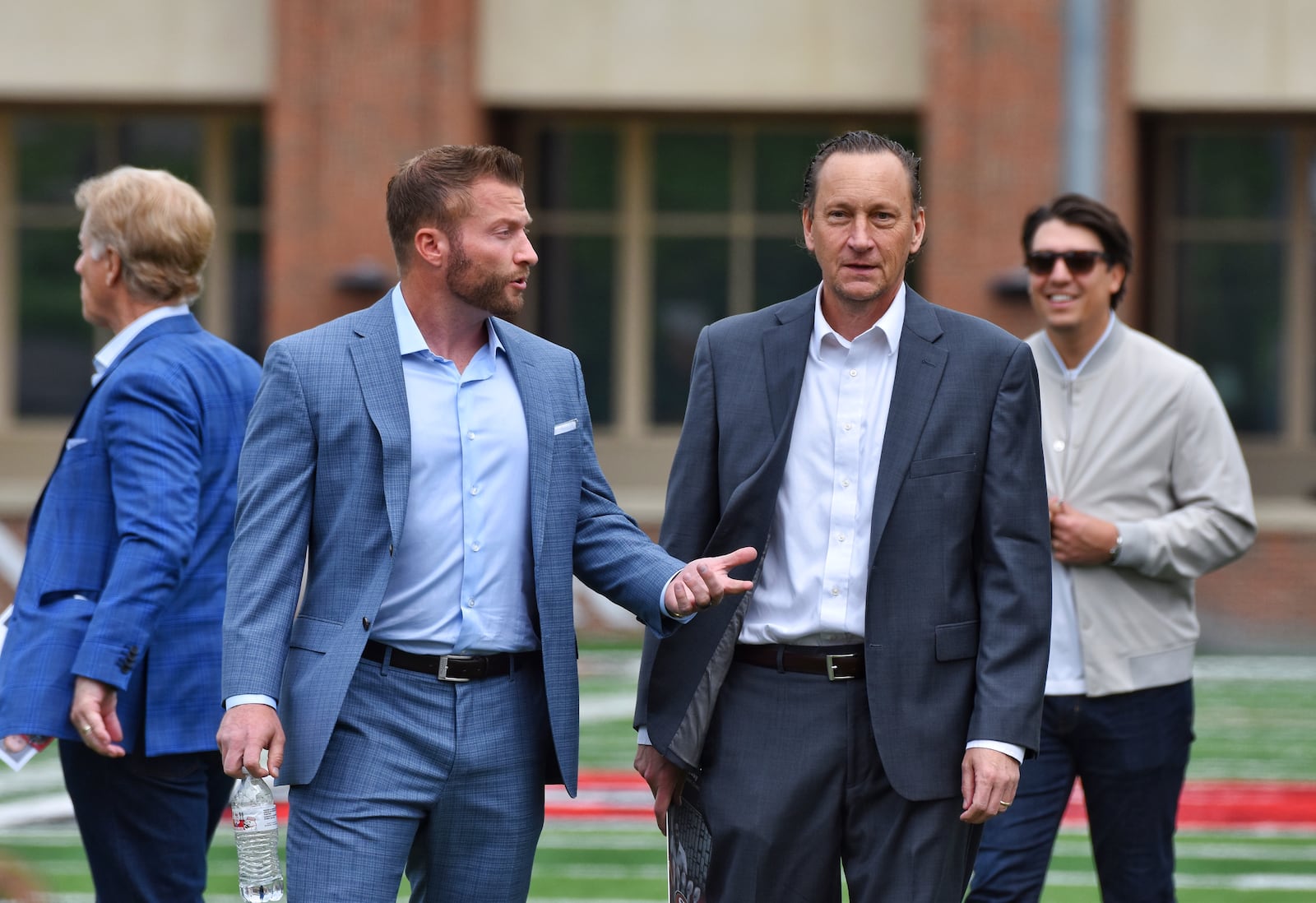 Miami University Athletic Director David Sayler (right) talks to Los Angeles Rams coach Sean McVay in 2023 when McVay was inducted into Miami's Cradle of the Coaches. Miami Athletics photo