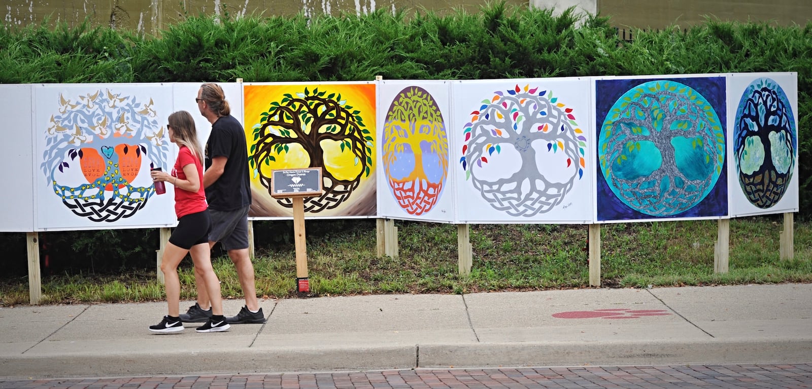 A nine-panel art display was installed on the western end of the Fifth Street business corridor in the Oregon District. MARSHALL GORBY / STAFF