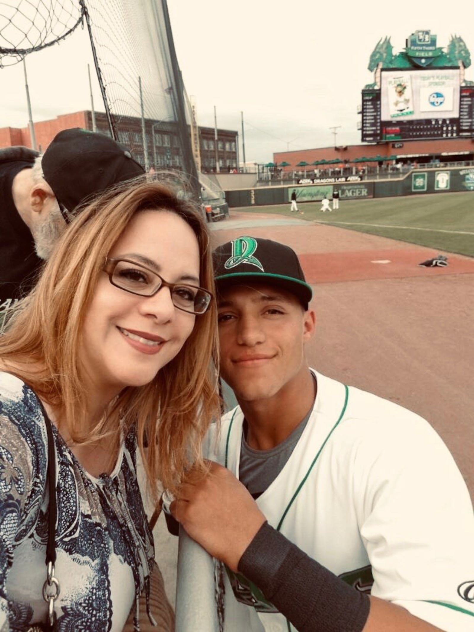 Brian Rey, when he played with the Dayton Dragons in 2019, with his mom, Maritza Feliciano. CONTRIBUTED