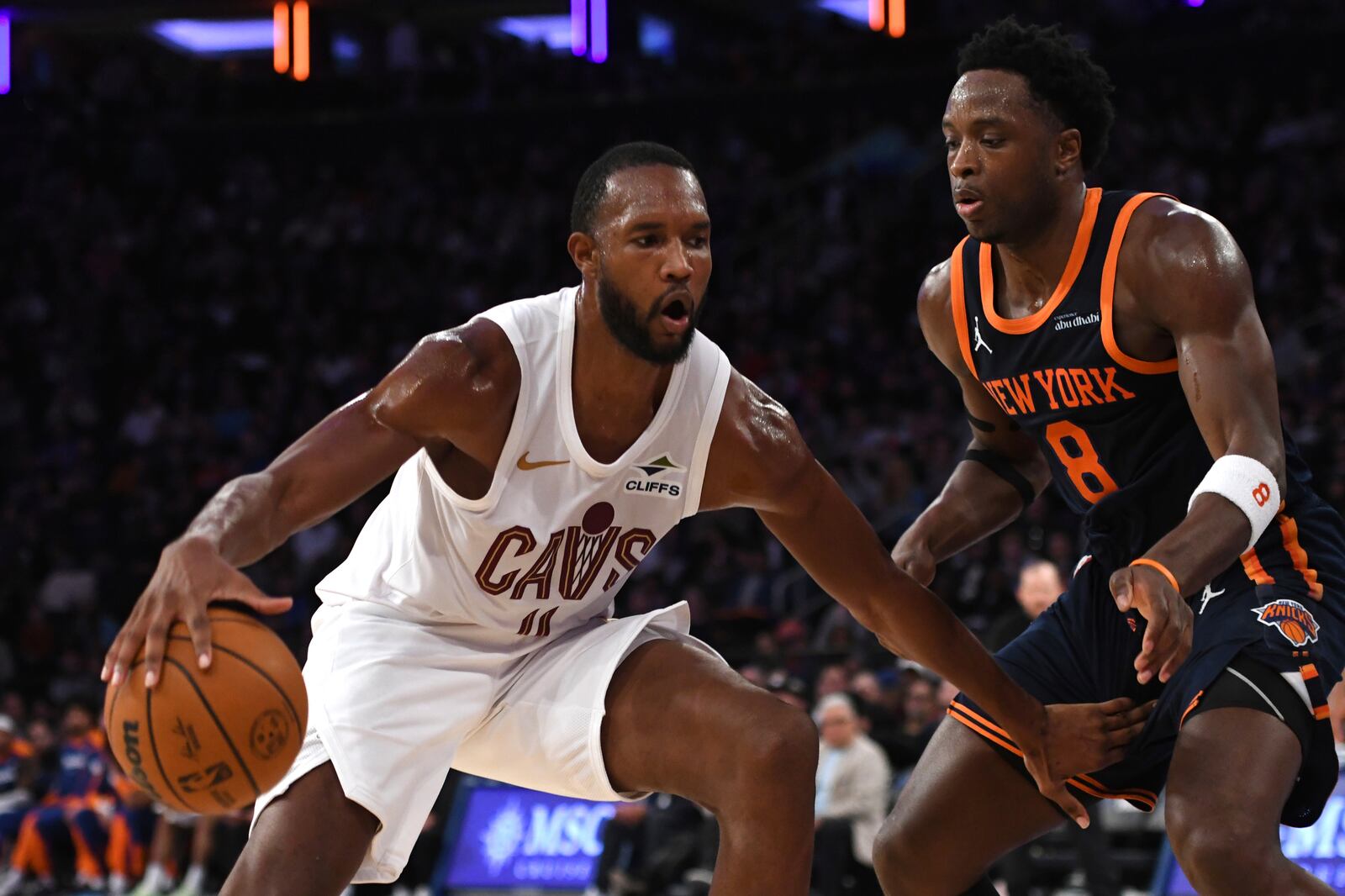 Cleveland Cavaliers' Evan Mobley, left, dribbles against New York Knicks' OG Anunoby, right, during the second half of an NBA basketball game, Monday, Oct. 28, 2024, in New York. (AP Photo/Pamela Smith)