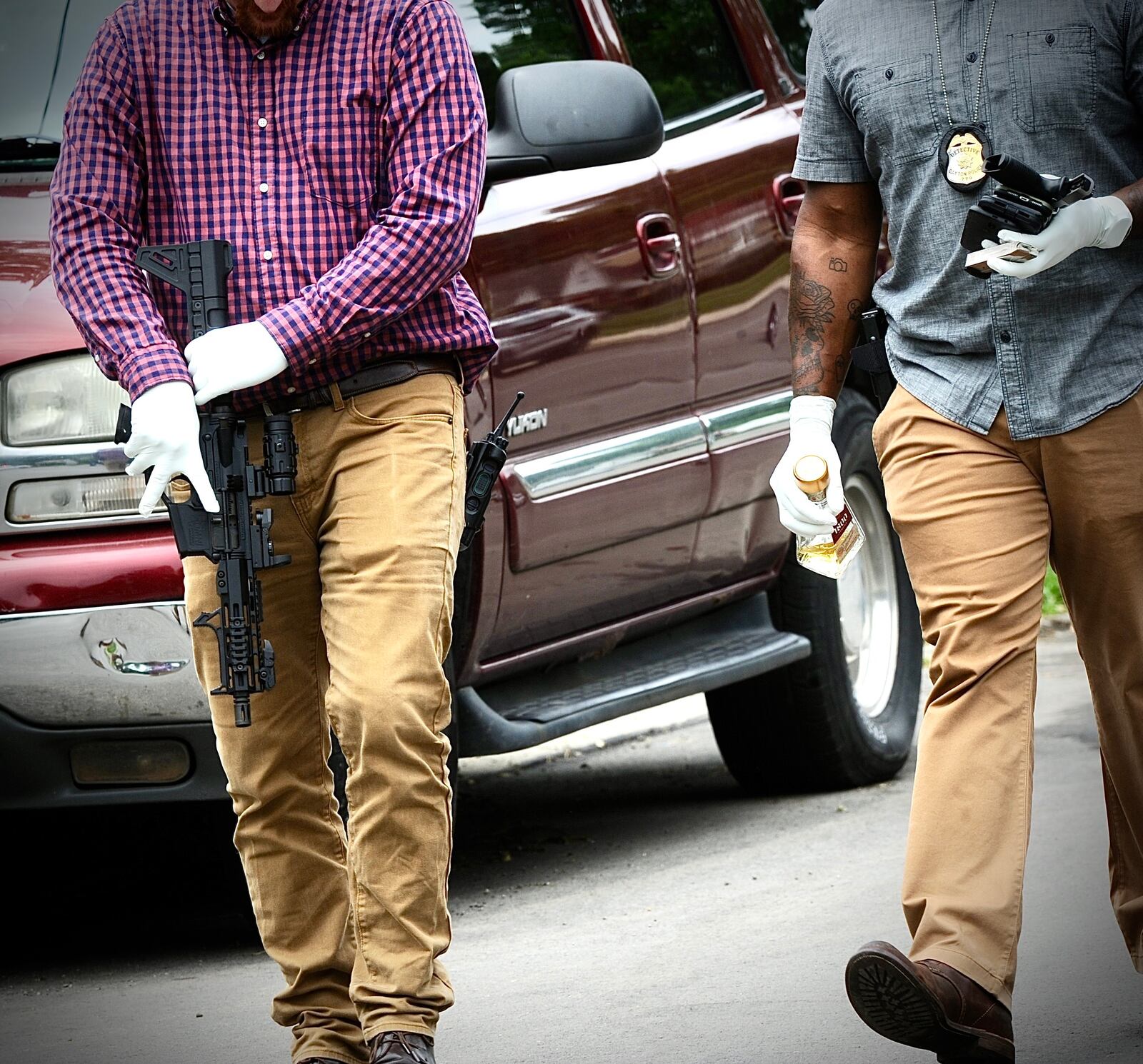 Dayton police seize two guns from the car of a man who was shooting into the air Wednesday, June 8, 2022, in the 100 block of Marathon Avenue. MARSHALL GORBY/ STAFF