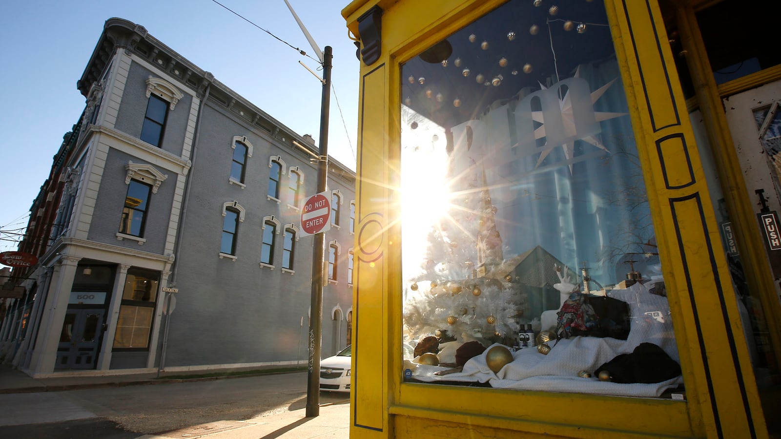 Architecture in the Oregon District is part of allure of historic area.  Real showcase windows like this one at BRIM allow for real window shopping.  TY GREENLEES / STAFF