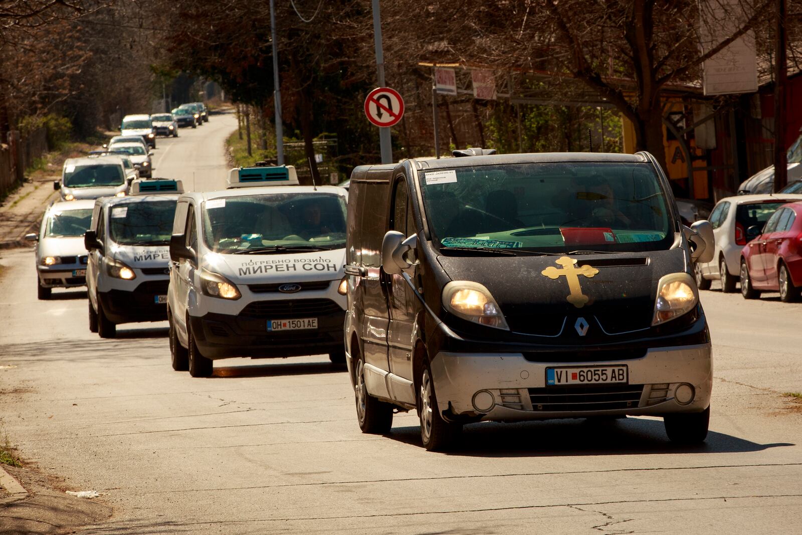 A convoy of vehicles transporting the bodies of the victims of a massive nightclub fire drives to a cemetery ahead of their funeral in the town of Kocani, North Macedonia, Thursday, March 20, 2025. (AP Photo/Visar Kryeziu)