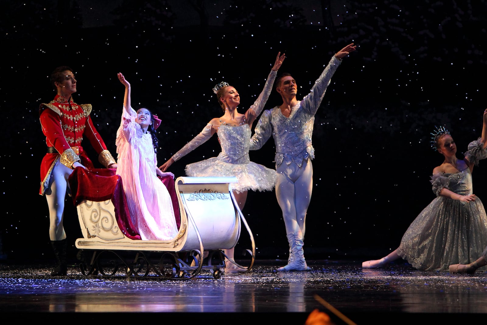 Clara is escorted by her Cavalier and the Snow King and Snow Queen off to the Land of Sweets in Dayton Ballet’s "The Nutcracker," slated Dec. 9-18 at the Schuster Center. CONTRIBUTED