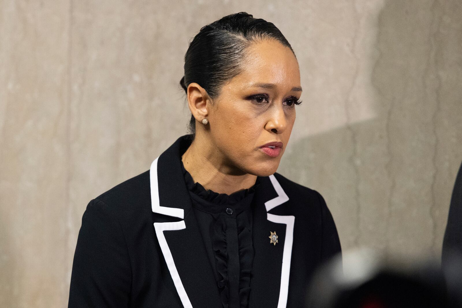 District Attorney Brooke Jenkins makes remarks at the Hall of Justice during the murder trial of Nima Momeni Tuesday, Dec. 17, 2024, in San Francisco. (AP Photo/Benjamin Fanjoy)