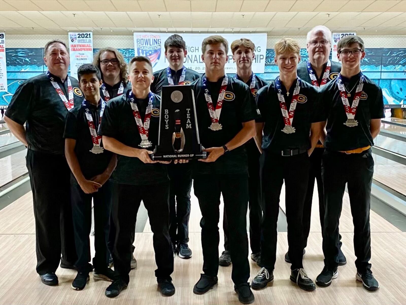 The Centerville boys team of (back row l to r) coach Jeff Rezabek, Cole Gregory, Nolan Caban, Jake Hamrick, coach Andy Parker and (front row) Vedanta Maladkar, Brendan Salo, Anthony Conty, Zach Hamrick and Casey Lippincott finished second at the U.S. High School Bowling National Championship - Contributed