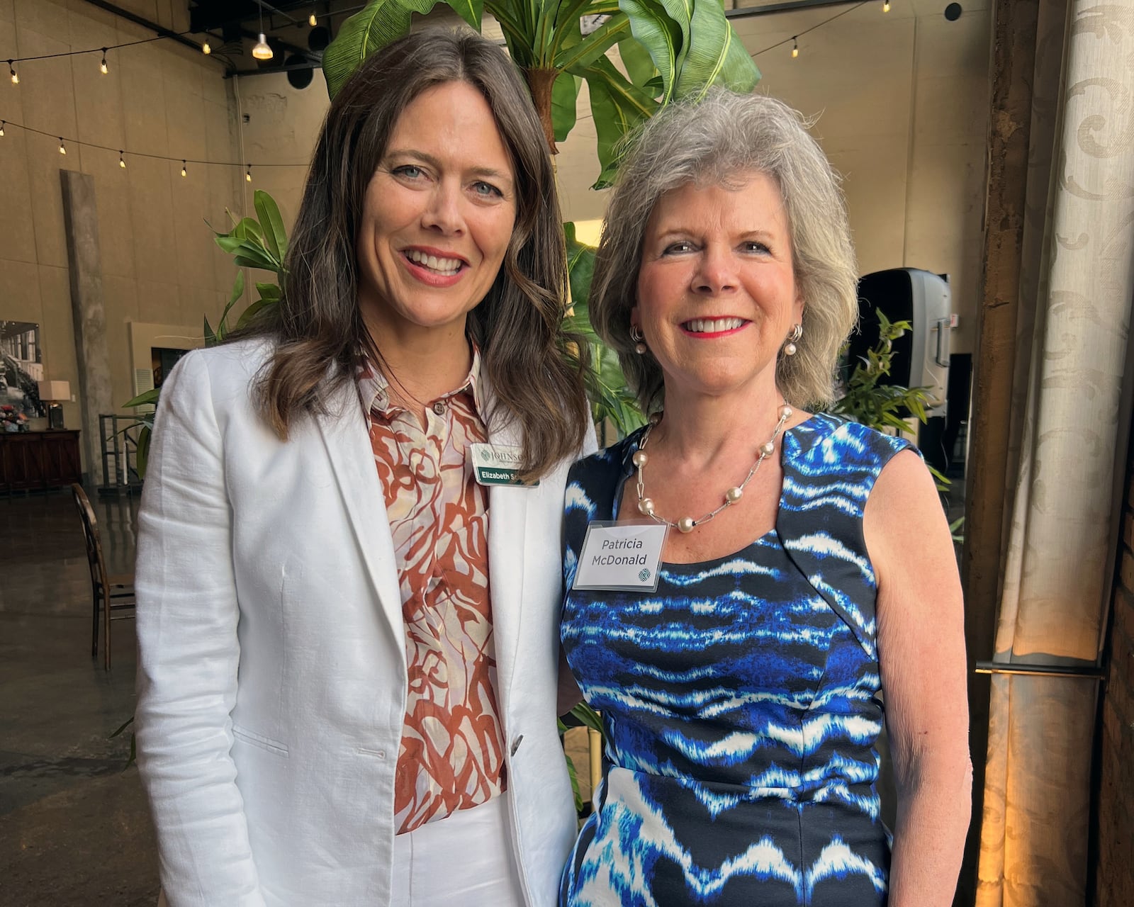 Elizabeth Schaefer (left) helped organize the first Powerhouse Event in Dayton in May, where Daytonian Pat McDonald (right), former market president KeyBank Dayton, was honored. CONTRIBUTED