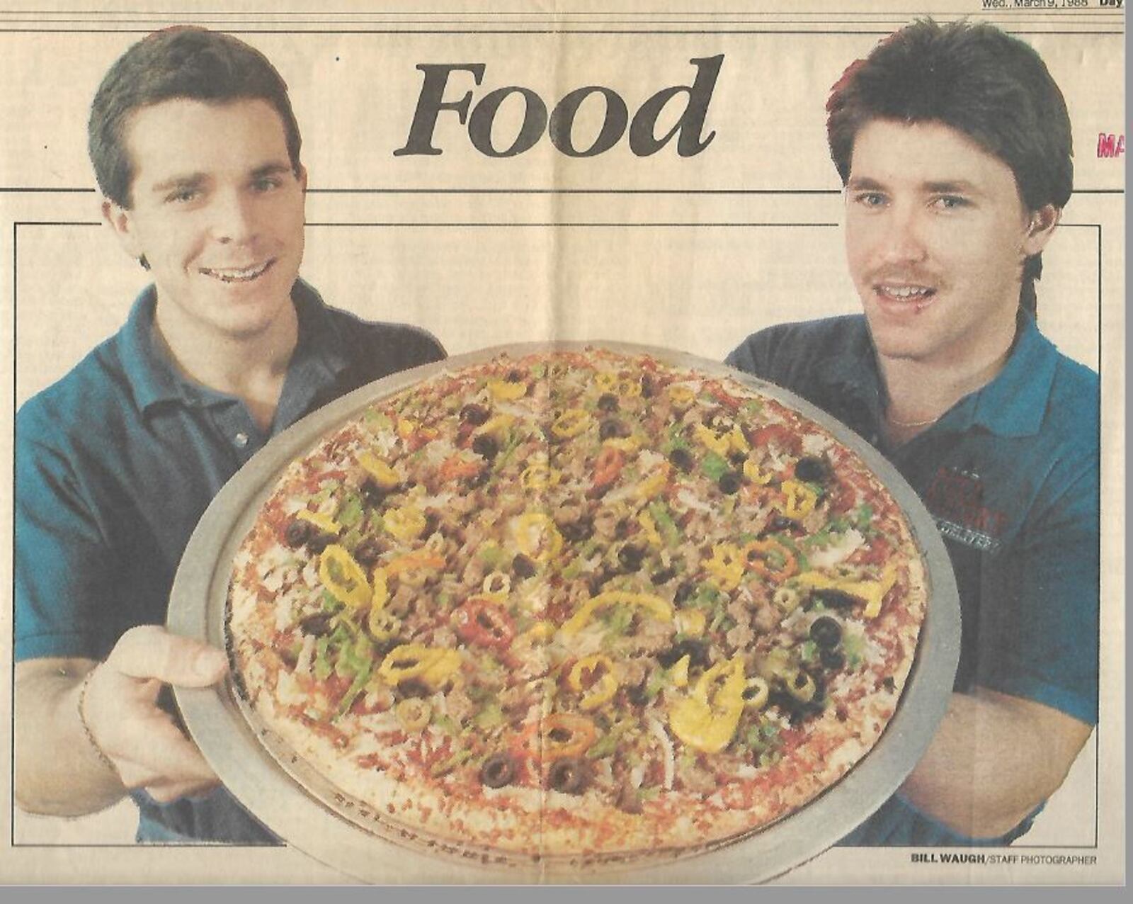 Bill Daniels (right) with his Dayton's Original Pizza Factory co-founder Glen Brailey on the cover of the Dayton Daily News in a 1988 story by Ann Heller about their new pizza venture. CONTRIBUTED