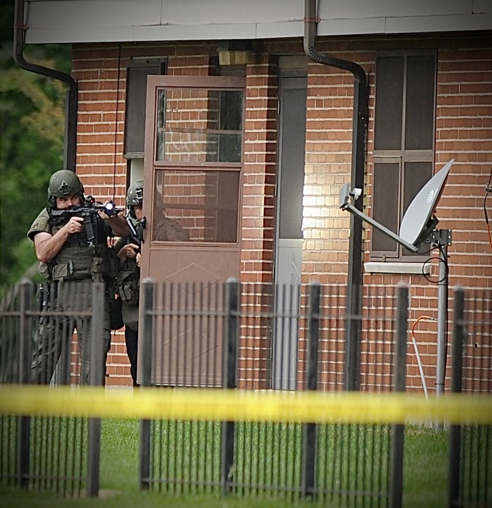 PHOTOS: SWAT standoff after shooting at Dayton apartments