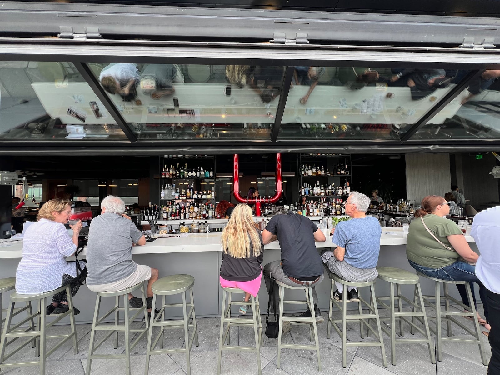 The bar at the Foundry restaurant at the AC Hotel in downtown Dayton opens up to the terrace in good weather.