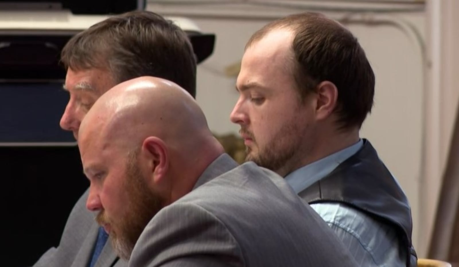 George Wagner IV is seen seated in the Pike County courtroom between his attorneys Oct. 3, 2022. Wagner faces charges of killing eight members of the Rhoden family in April 2016. CONTRIBUTED/WCPO