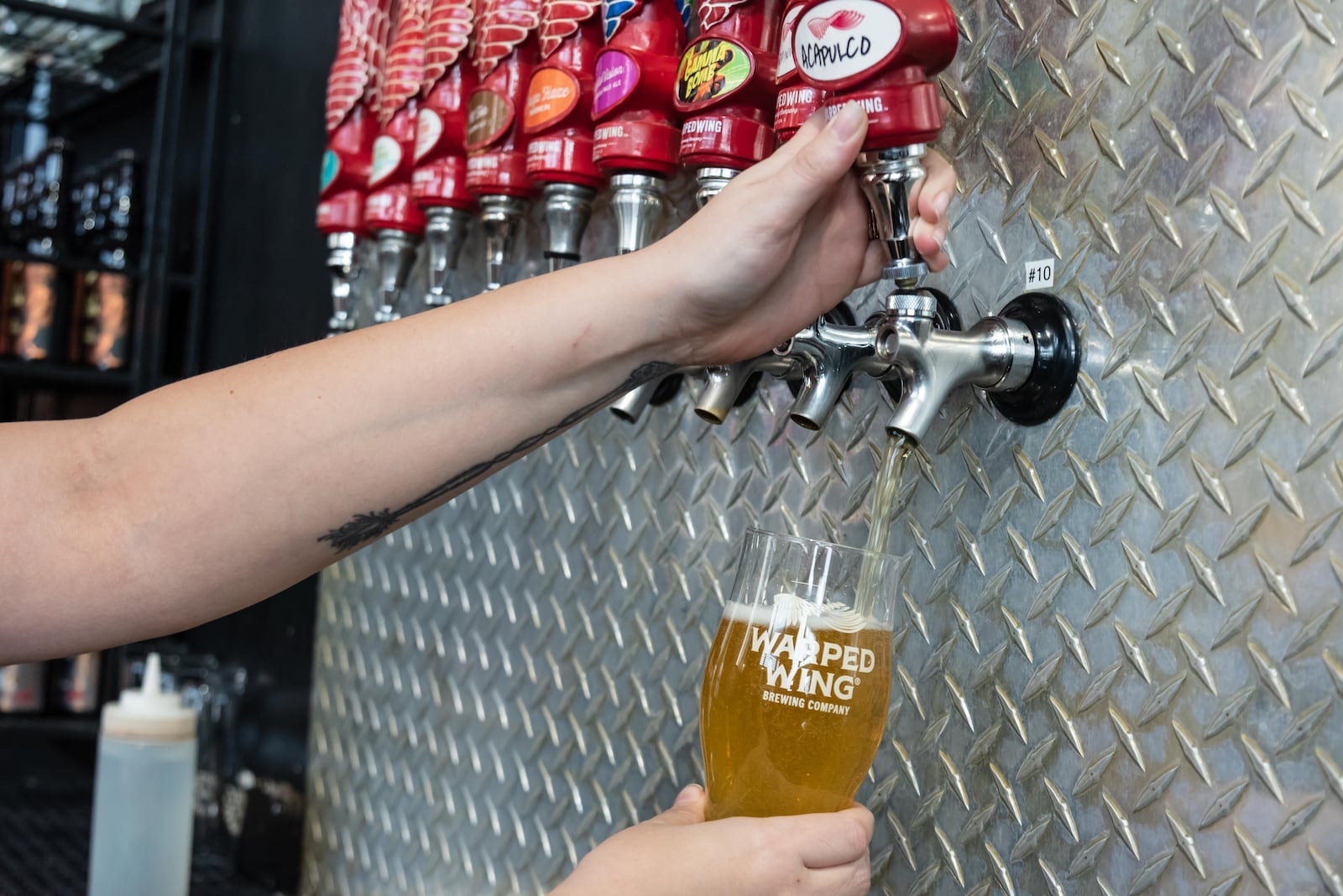 Warped Wing Brewing Company has three locations (Dayton, Springboro, Mason) in the region and is opening a fourth (Huber Heights) this spring/summer. TOM GILLIAM/CONTRIBUTING PHOTOGRAPHER