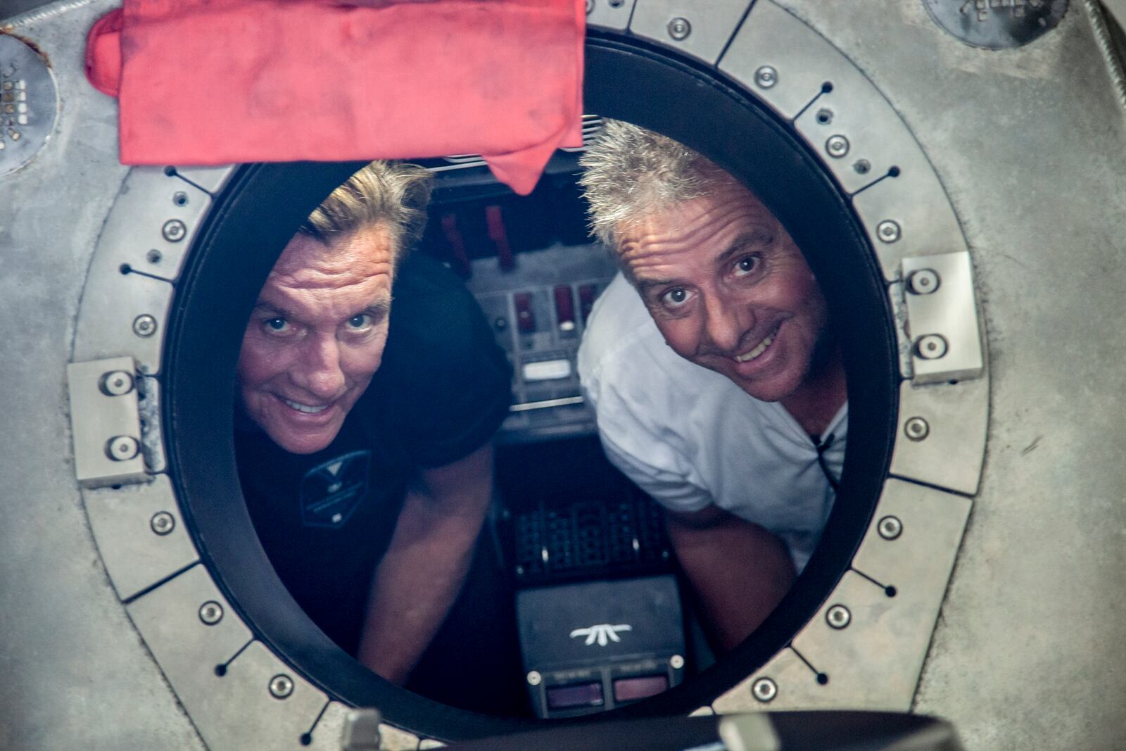 
                        A photo provided by Connor Group shows Larry Connor, left, with Patrick Lahey during a 2021 trip to Mariana Trench in the Western Pacific Ocean, where they went on a series of deep dives. Larry Connor, 74, who made his wealth in real estate, said he’s building a new acrylic-hulled submersible that will be certified and rigorously tested to show that deep sea exploration is safe. (Connor Group via The New York Times) -- NO SALES; FOR EDITORIAL USE ONLY WITH NYT STORY SLUGGED TITANIC SUBMERSIBLE BY EMILY SCHMALL AND ORLANDO MAYORQUÍN FOR MAY 28, 2024. ALL OTHER USE PROHIBITED. --
                      