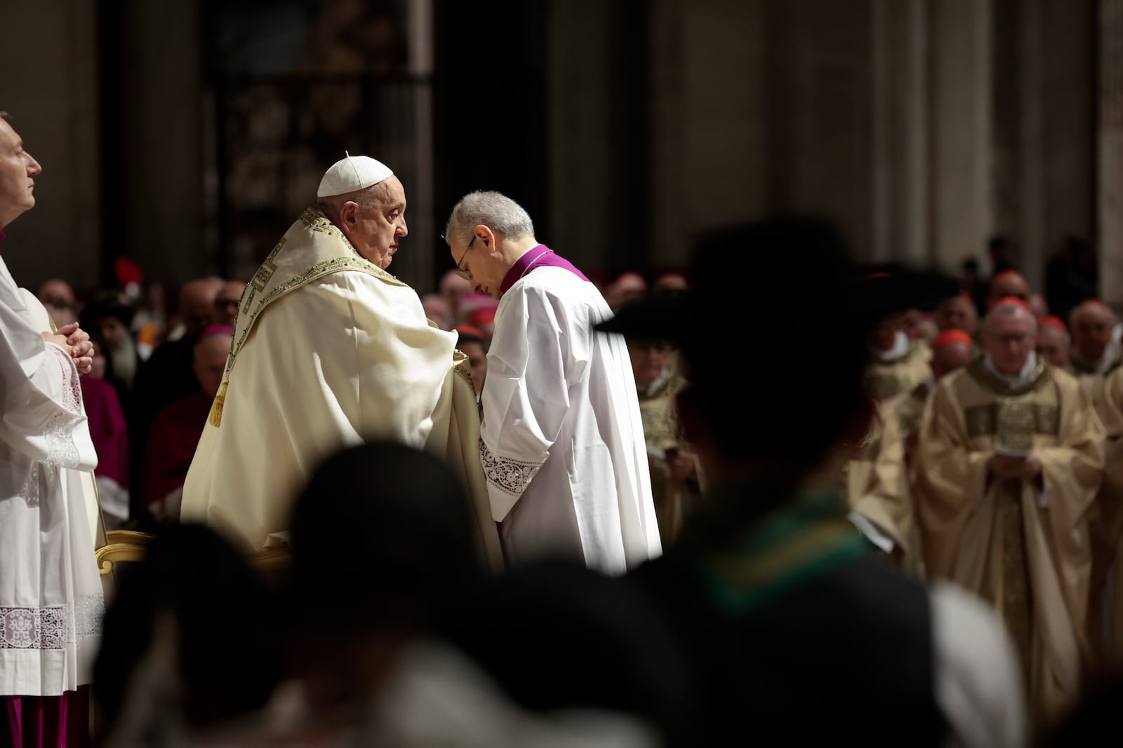 Pope Francis celebrates a Christmas Eve Mass on the day the Pope opens the Holy Door to mark the opening of the 2025 Catholic Holy Year, or Jubilee, in St. Peter's Basilica, at the Vatican, Dec. 24, 2024. (Remo Casilli/Pool Photo via AP)