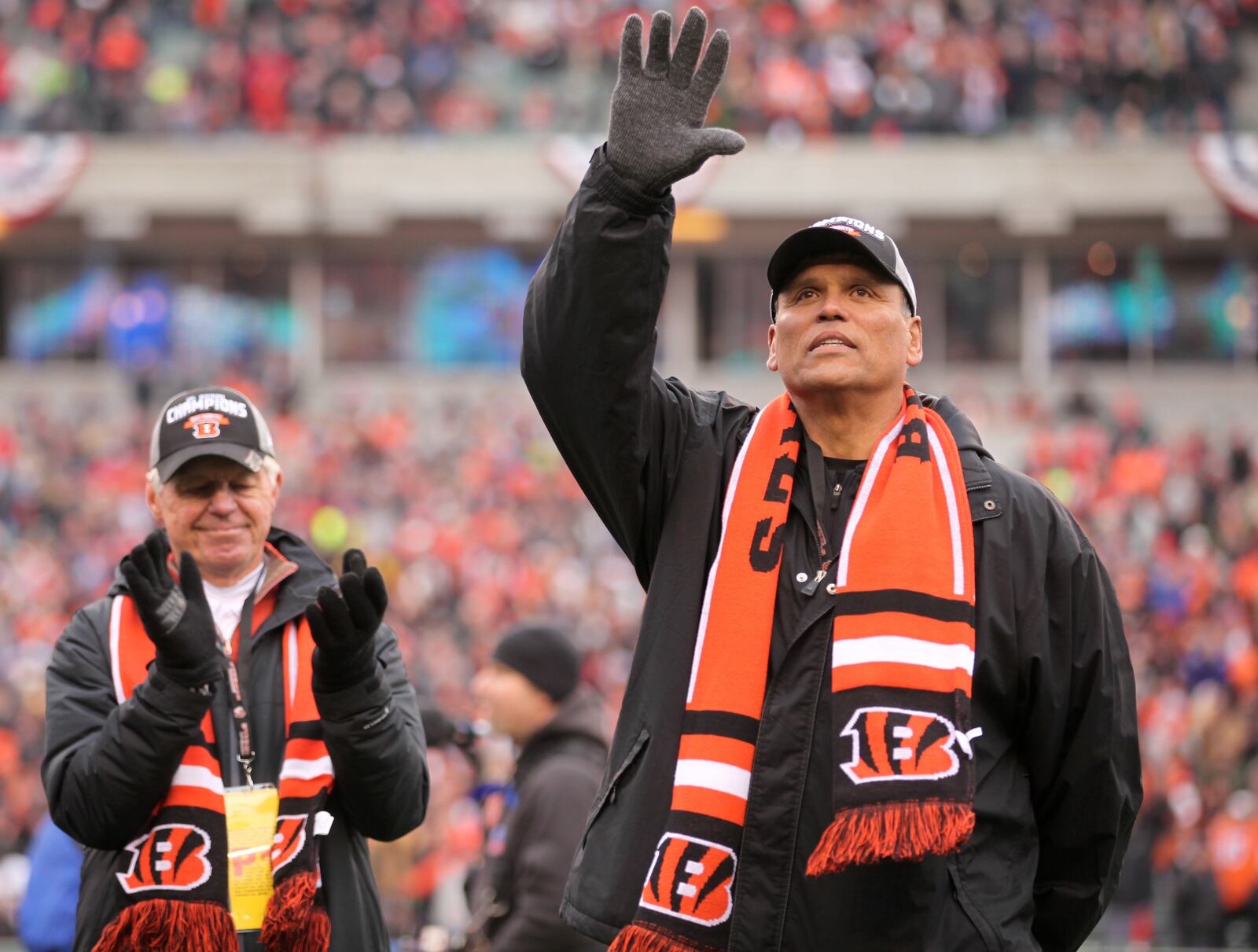 Cincinnati Bengals Hall-of-Famer Anthony Munoz, right, was honored along with the 1982 Freezer Bowl team before the NFL playoff game on Sunday, Jan. 5, 2013, at Paul Brown Stadium in Cincinnati, Ohio. Kareem Elgazzar | WCPO Cincinnati