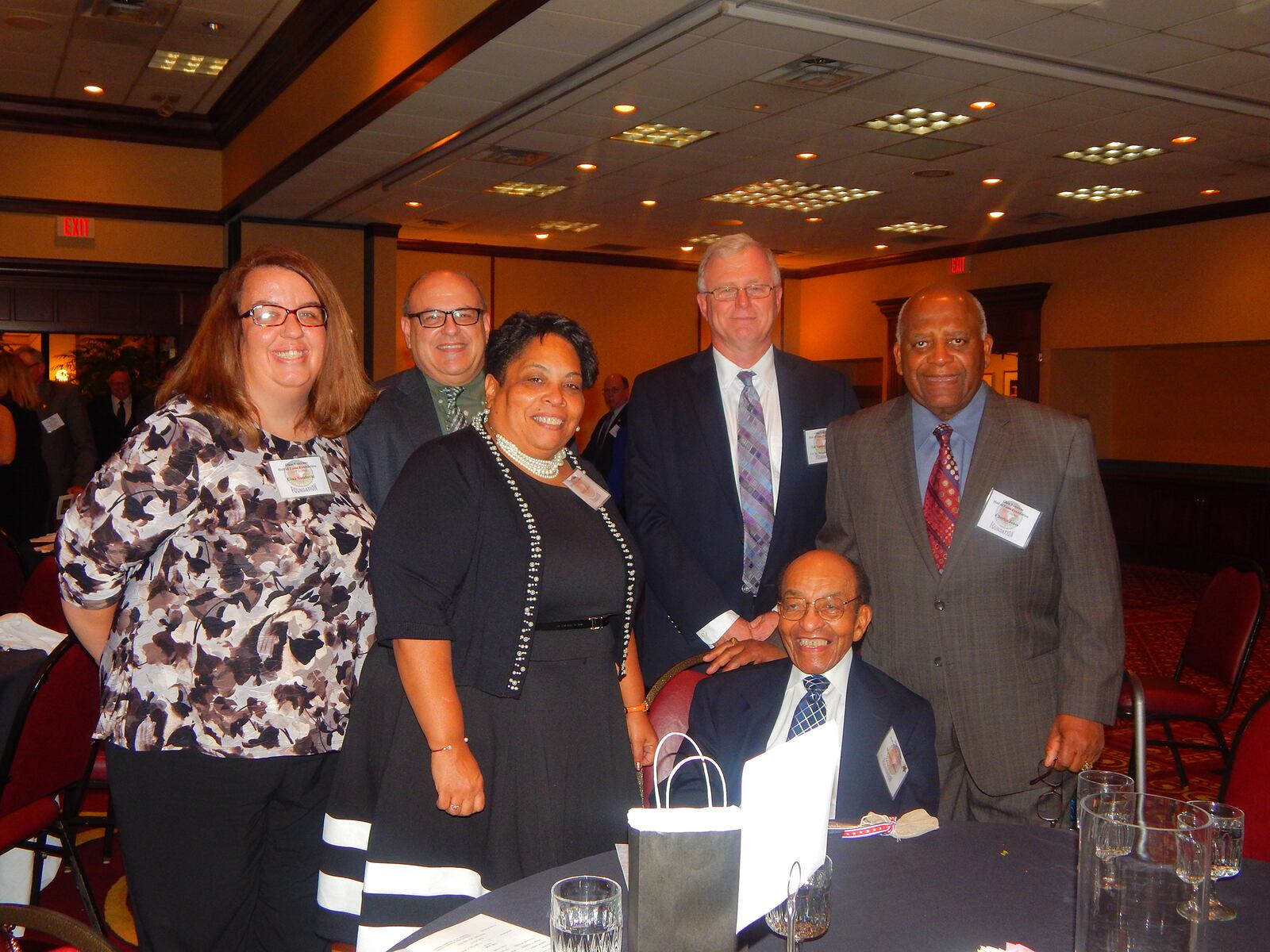 Waverly Glover (seated) was inducted into the Ohio Veterans' Hall of Fame in 2015. He is shown with volunteers and staff of the Dayton Foundation and his daughter Pam. Gina Sandoval, marketing and communications officer at the foundation, wrote his nomination. CONTRIBUTED