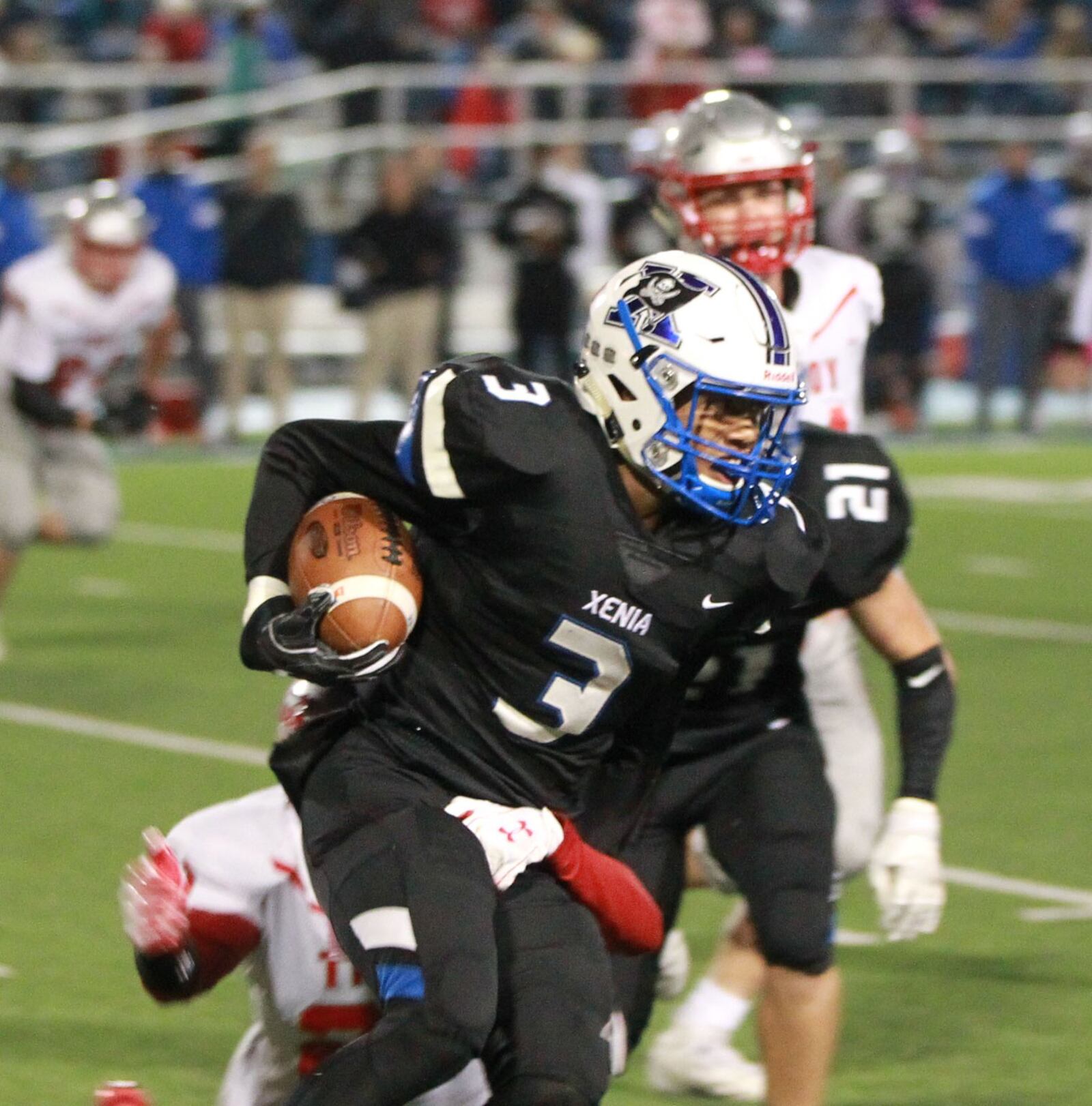 Kevin Johnson of Xenia makes a short gain. Xenia defeated visiting Troy 24-22 in a Week 9 high school football game on Friday, Oct. 25, 2019. MARC PENDLETON / STAFF