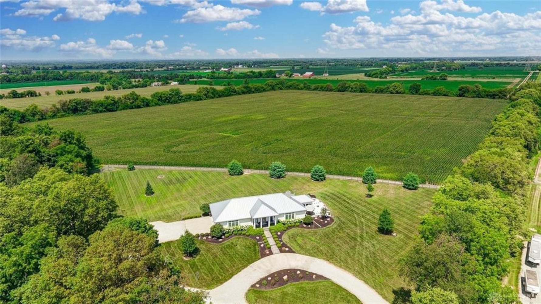 PHOTOS: $1.59M Miami County luxury home on 45-acre property