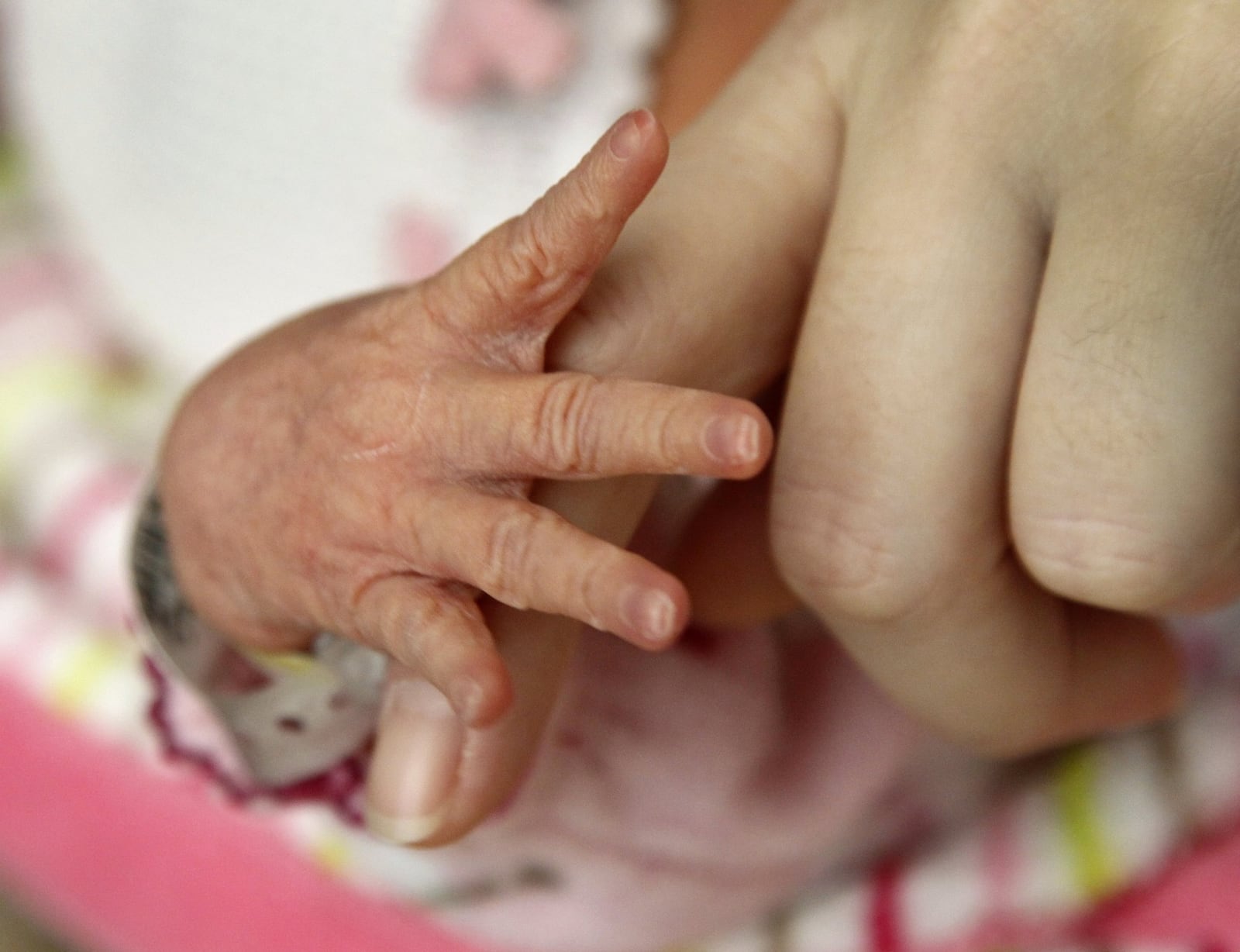 A baby born at Miami Valley Hospital. LISA POWELL / STAFF