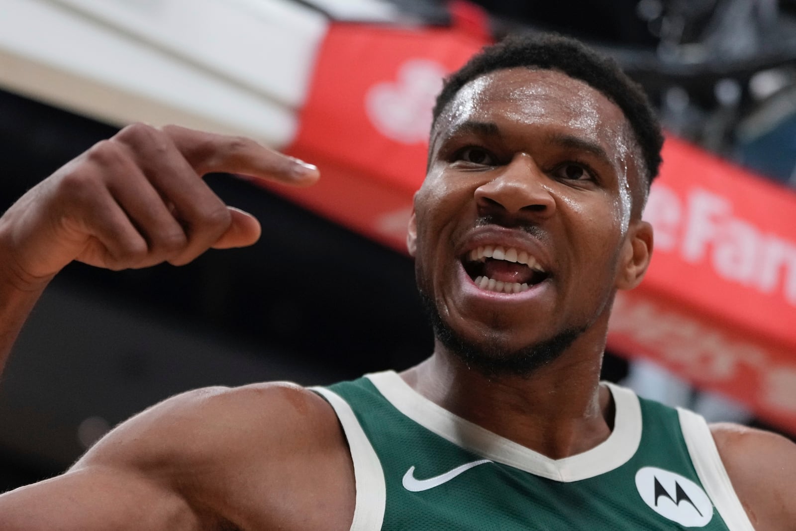 Milwaukee Bucks' Giannis Antetokounmpo reacts after making a shot and being fouled during the first half of an NBA basketball game Saturday, Nov. 2, 2024, in Milwaukee. (AP Photo/Morry Gash)