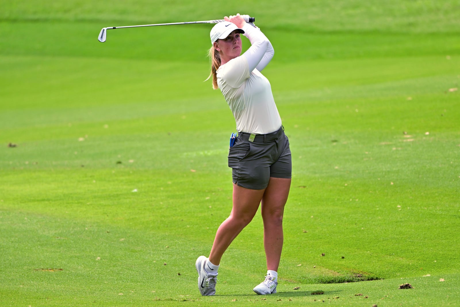 Maja Stark of Sweden watches her shot on the 18h hole during the first round of the LPGA Honda Thailand golf tournament in Pattaya, southern Thailand, Thursday, Feb. 20, 2025. (AP Photo/Kittinun Rodsupan)