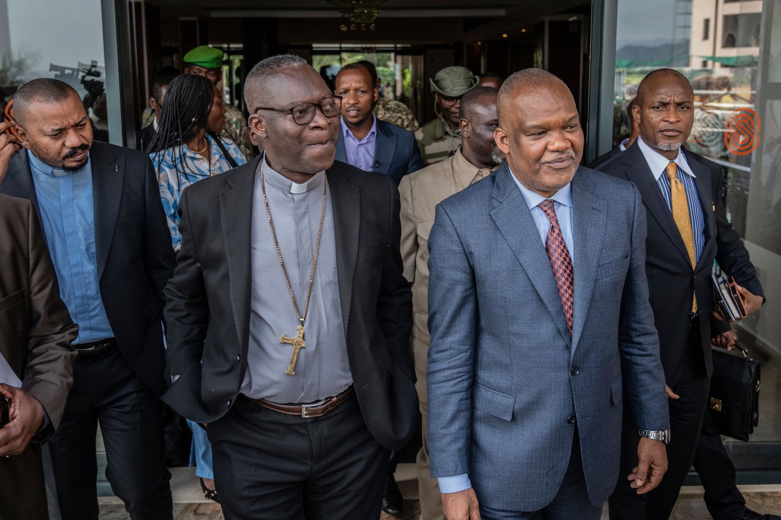 Members of the National Episcopal Conference of Congo and the Church of Christ arrived for a meeting with the Leader of the political military coalition in Goma, Democratic Republic of the Congo, Wednesday, Feb. 12, 2025. (AP Photo/Moses Sawasawa)