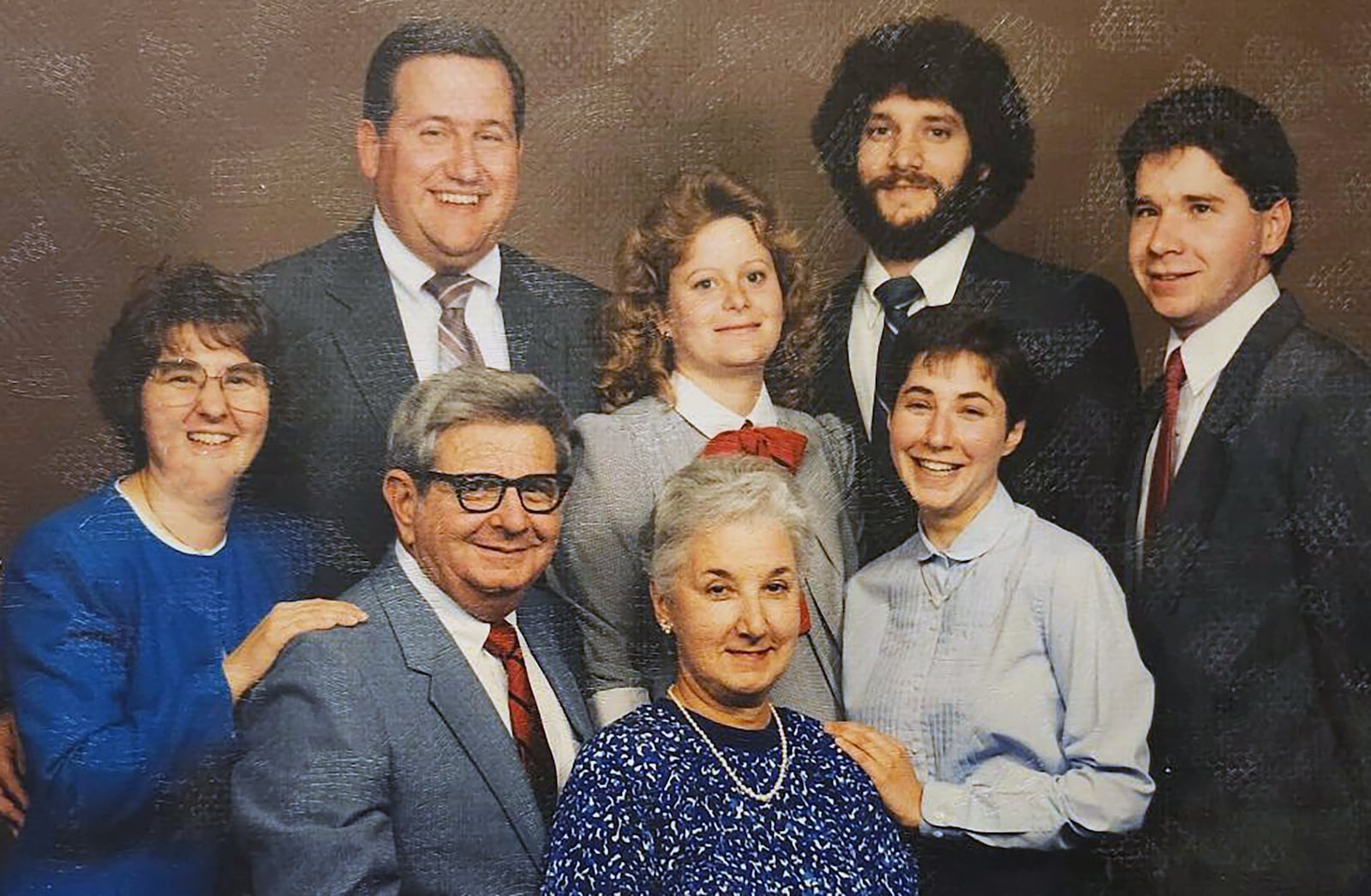 The Speyrer family in the 1990's Pictured back row, left to right: Anna Beechey (sister), her husband Kevin Beechy, sister in law Dorothy, brother James and sister Francis Speyrer and Chris Speyrer. Front row James Harold Speyrer (dad) Betty Speyrer (mom)