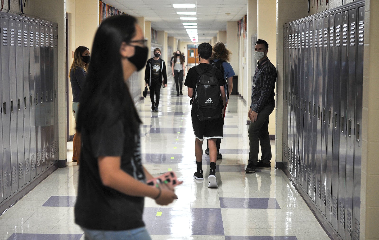 Students walk to classes at Bellbrook High School in fall 2020. MARSHALL GORBY\STAFF