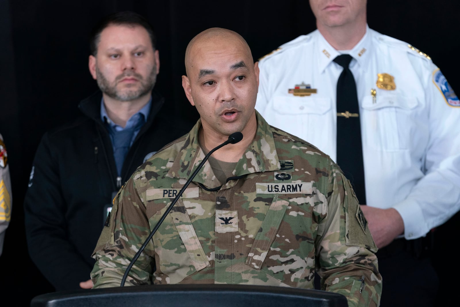 Col. Francis Pera, commander of the U.S. Army Corps of Engineers, speaks during a news conference at Ronald Reagan Washington National Airport, Sunday, Feb. 2, 2025, in Arlington, Va. (AP Photo/Jose Luis Magana)