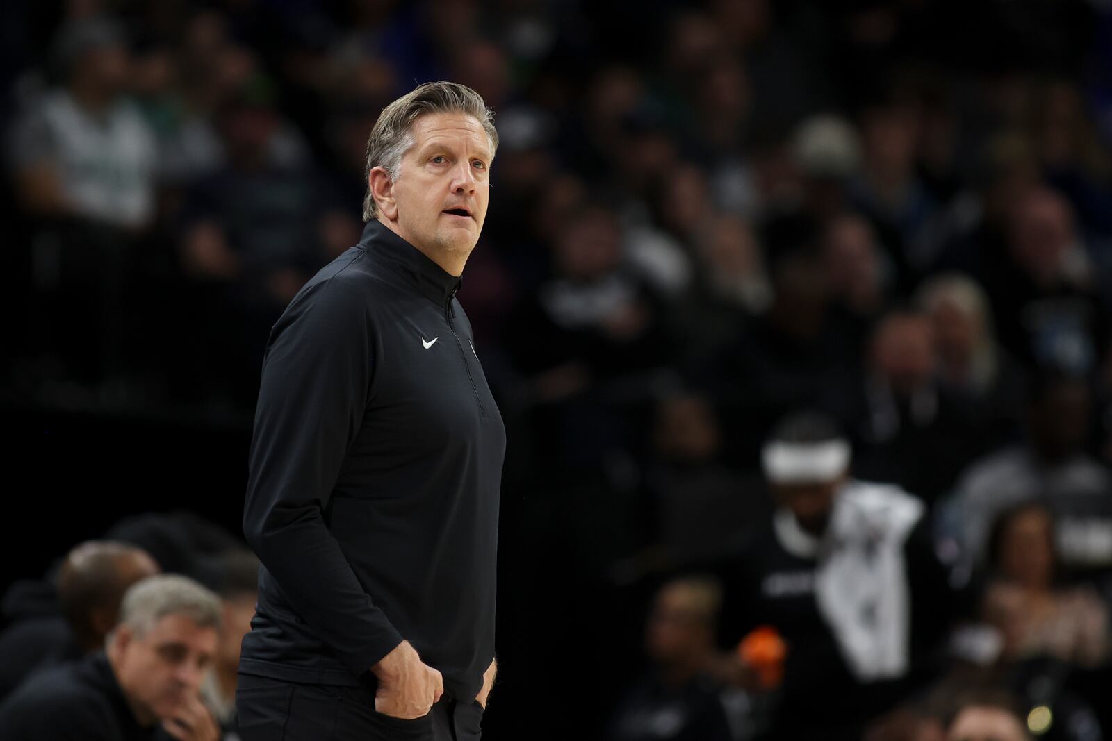 Minnesota Timberwolves head coach Chris Finch watches the action during the first half of an NBA basketball game against the Sacramento Kings, Wednesday, Nov. 27, 2024, in Minneapolis. (AP Photo/Ellen Schmidt)