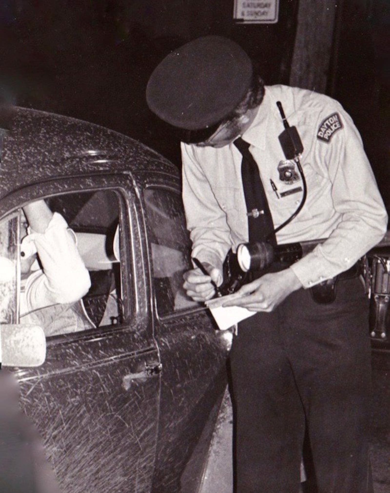 Dayton Police Officer William Steven Whalen on a traffic stop in the 1980s.Officer Whalen was killed in the line of duty in 1991.  DAYTON POLICE HISTORY FOUNDATION