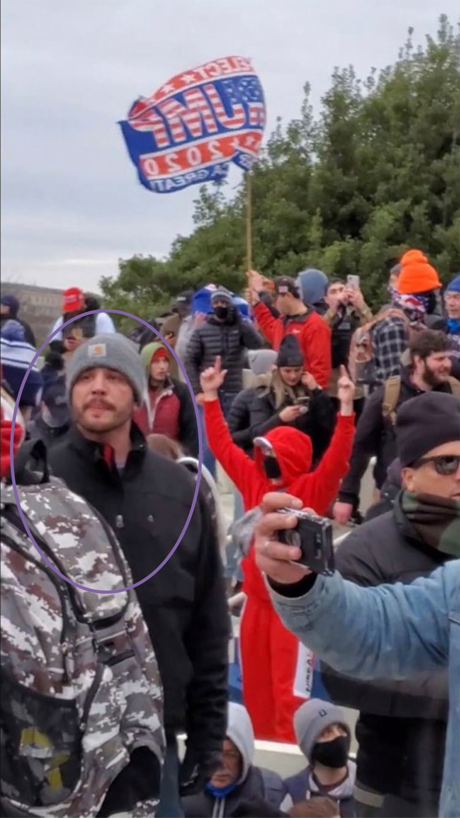 This image provided by District of Columbia Attorney's Office obtained from the U.S. Capitol Police shows Matthew Huttle outside the Capitol building on Jan. 6, 2021 in Washington. (Attorney's Office, District of Columbia via AP)