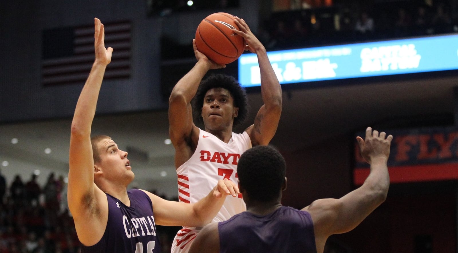 Dayton’s Jhery Matos shoots against Capital in an exhibition game on Friday, Nov. 2, 2018, at UD Arena. David Jablonski/Staff