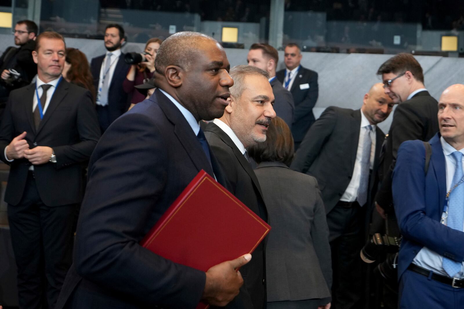 British Foreign Secretary David Lammy, left, walks with Turkey's Foreign Minister Hakan Fidan during a meeting of NATO foreign ministers at NATO headquarters in Brussels, Wednesday, Dec. 4, 2024. (AP Photo/Virginia Mayo)