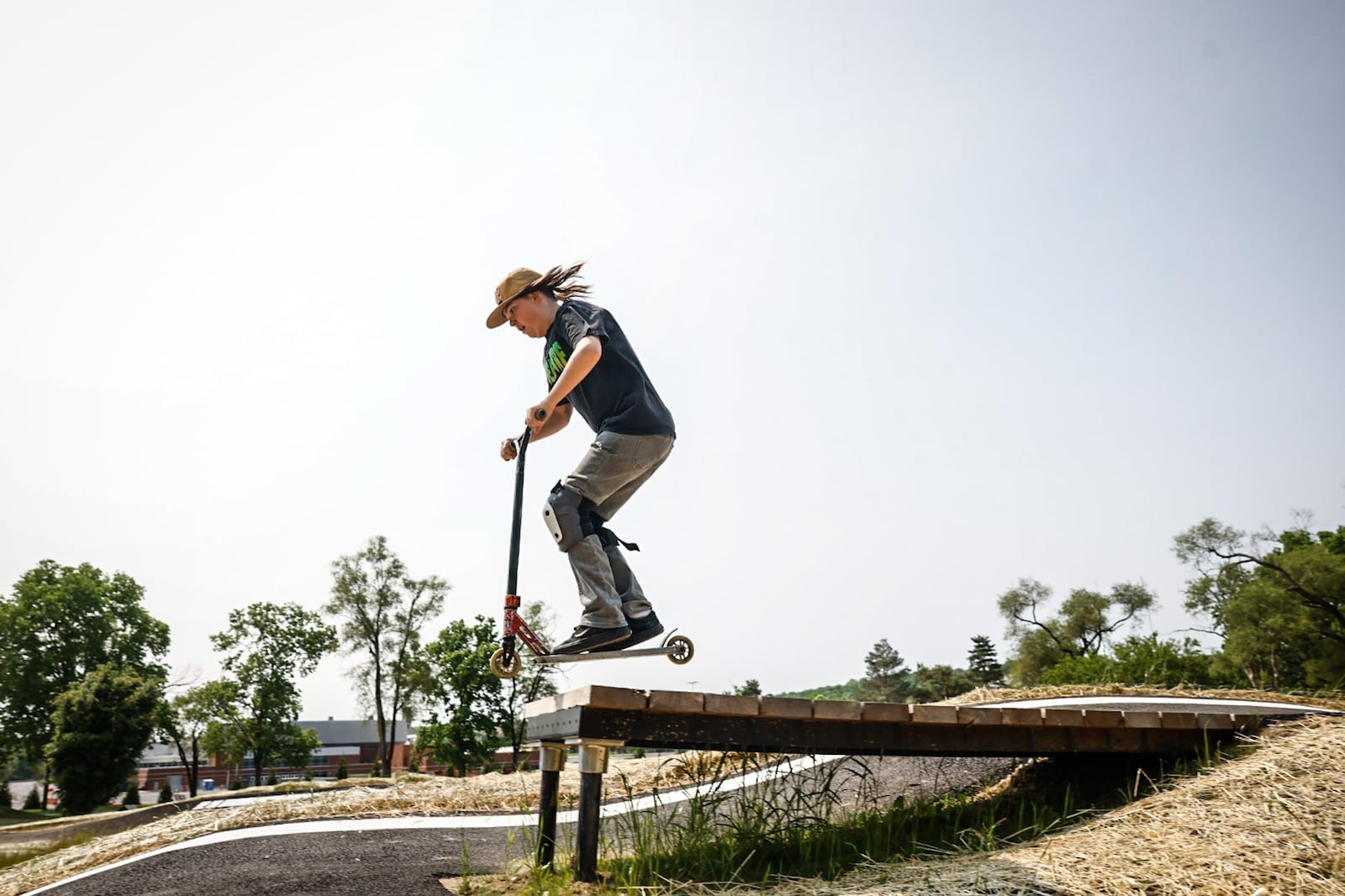 Xander Barrett, 14, from Dayton, tries out the Dayton Bike Yard Thursday May 18, 2023. The Bike Yard has an official grand opening on this Saturday. JIM NOELKER/STAFF