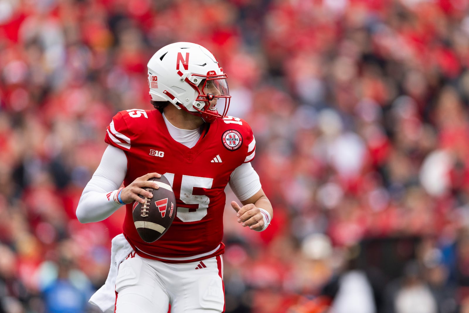 Nebraska quarterback Dylan Raiola (15) looks for a receiver against UCLA during the first half of an NCAA college football game Saturday, Nov. 2, 2024, in Lincoln, Neb. (AP Photo/Rebecca S. Gratz)