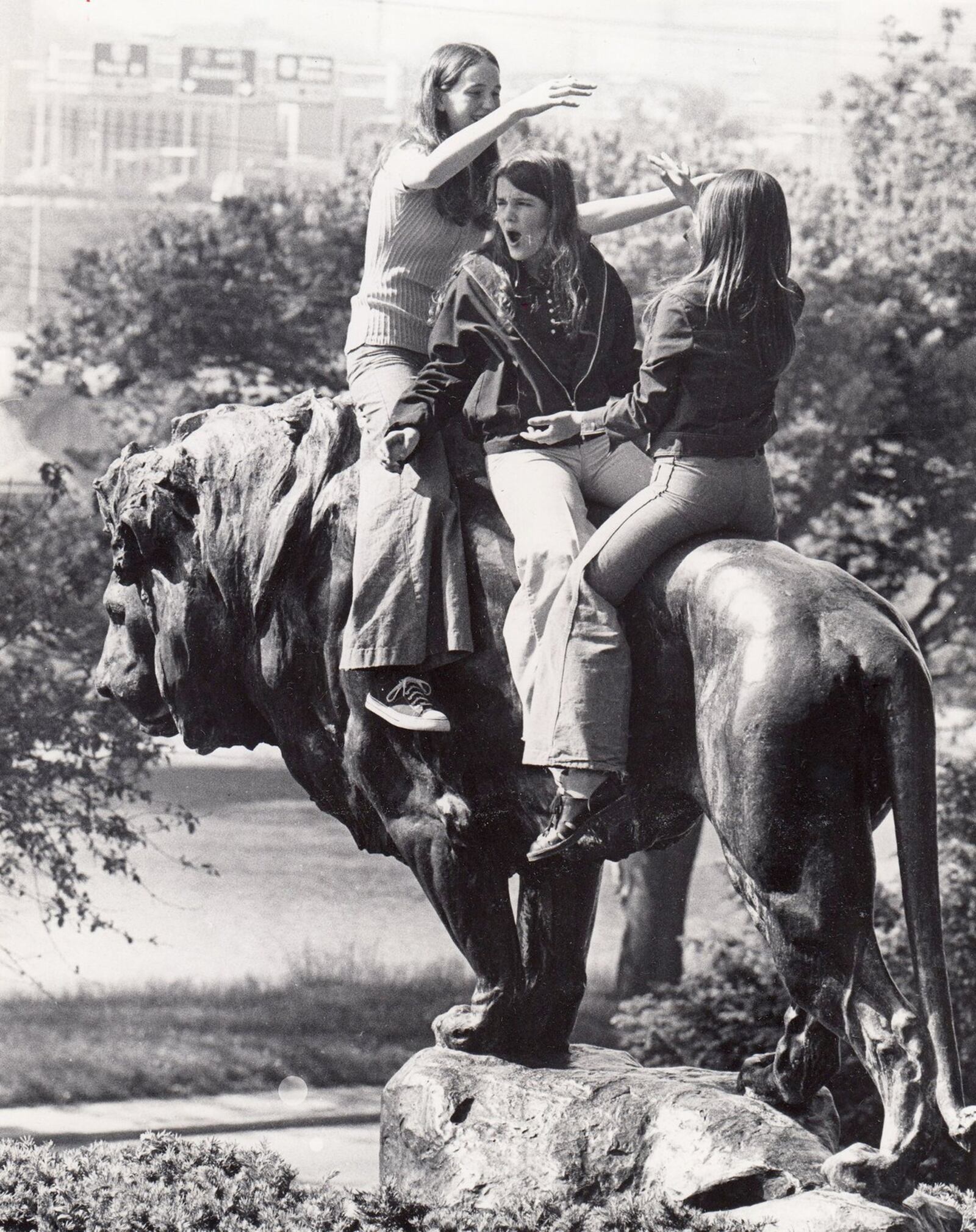 Longfellow School eighth grade students Cindy Miller, Barbara Weber and Sharon Schamel were photographed in 1973 on the back of Leo the Lion at his perch outside the Dayton Art Institute. DAYTON DAILY NEWS ARCHIVE