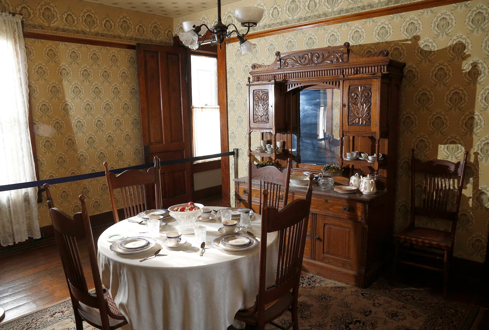 The hutch in the dining room of the Paul Laurence Dunbar House was able to roll away from the wall and bed would fold out of the back. LISA POWELL / STAFF