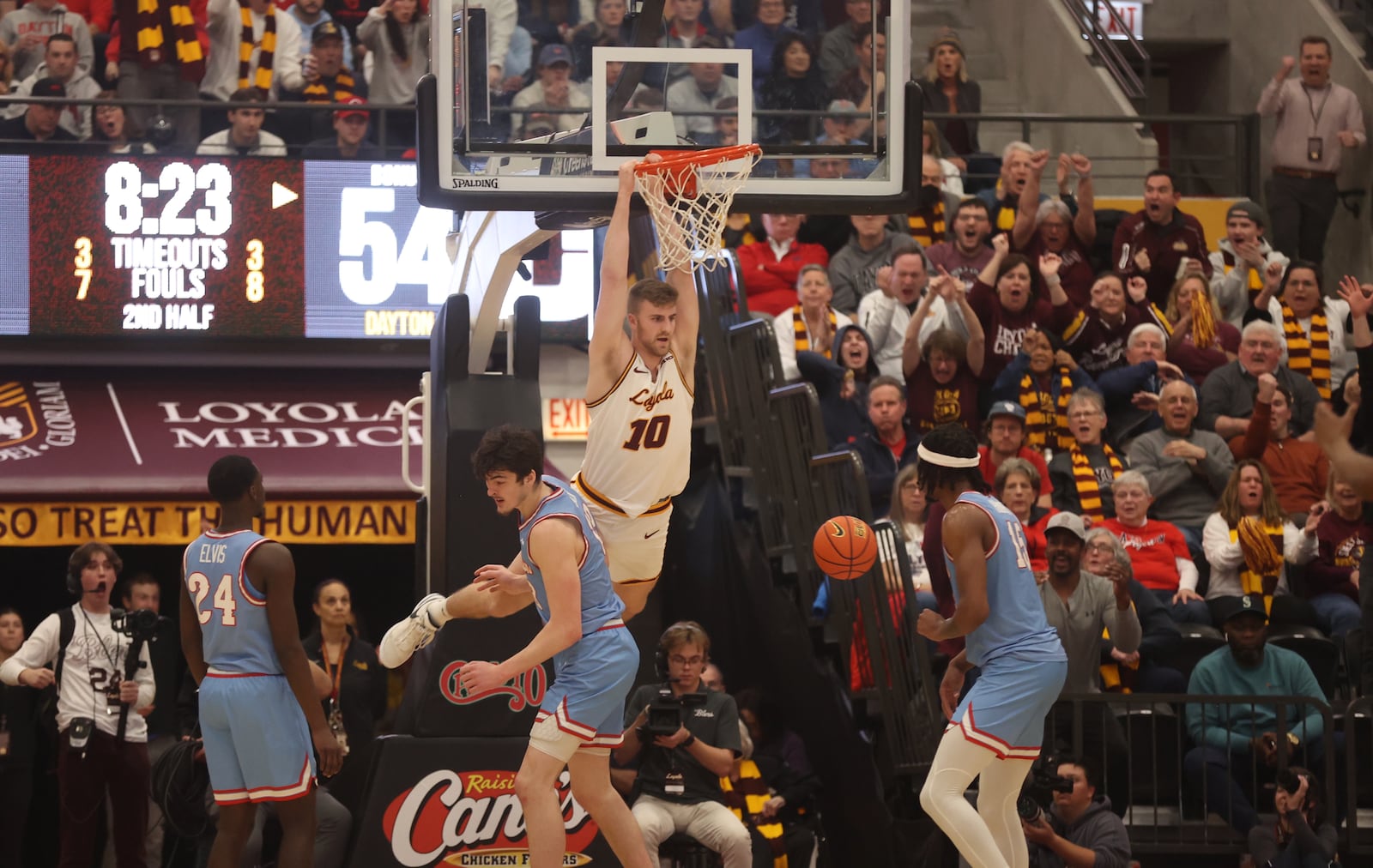 Loyola Chicago's Tom Welch dunks against Dayton on Friday, March 1, 2024, at Gentile Arena in Chicago. David Jablonski/Staff