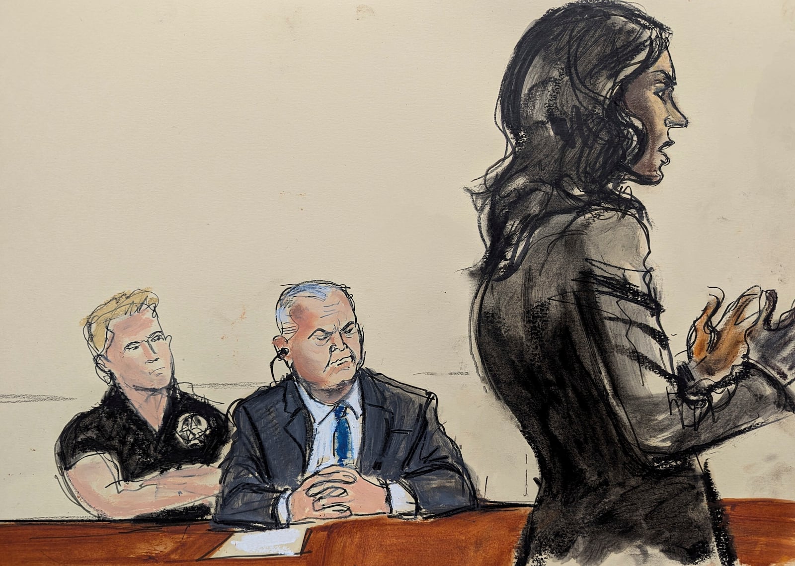 Assistant US Attorney Saritha Komatireddy, right, gives the government sentencing statement while Genaro Garcia Luna, center, looks on in Brooklyn federal court, Wednesday, Oct. 16, 2024, in New York. (Elizabeth Williams via AP)