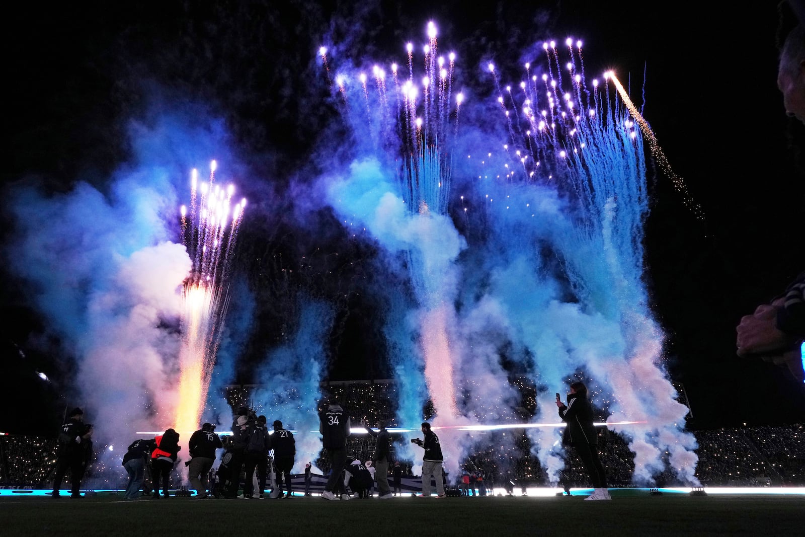 Fireworks illuminate the field during a ceremony before San Diego FC hosts an MLS soccer match against St. Louis City Saturday, March 1, 2025, in San Diego. (AP Photo/Gregory Bull)