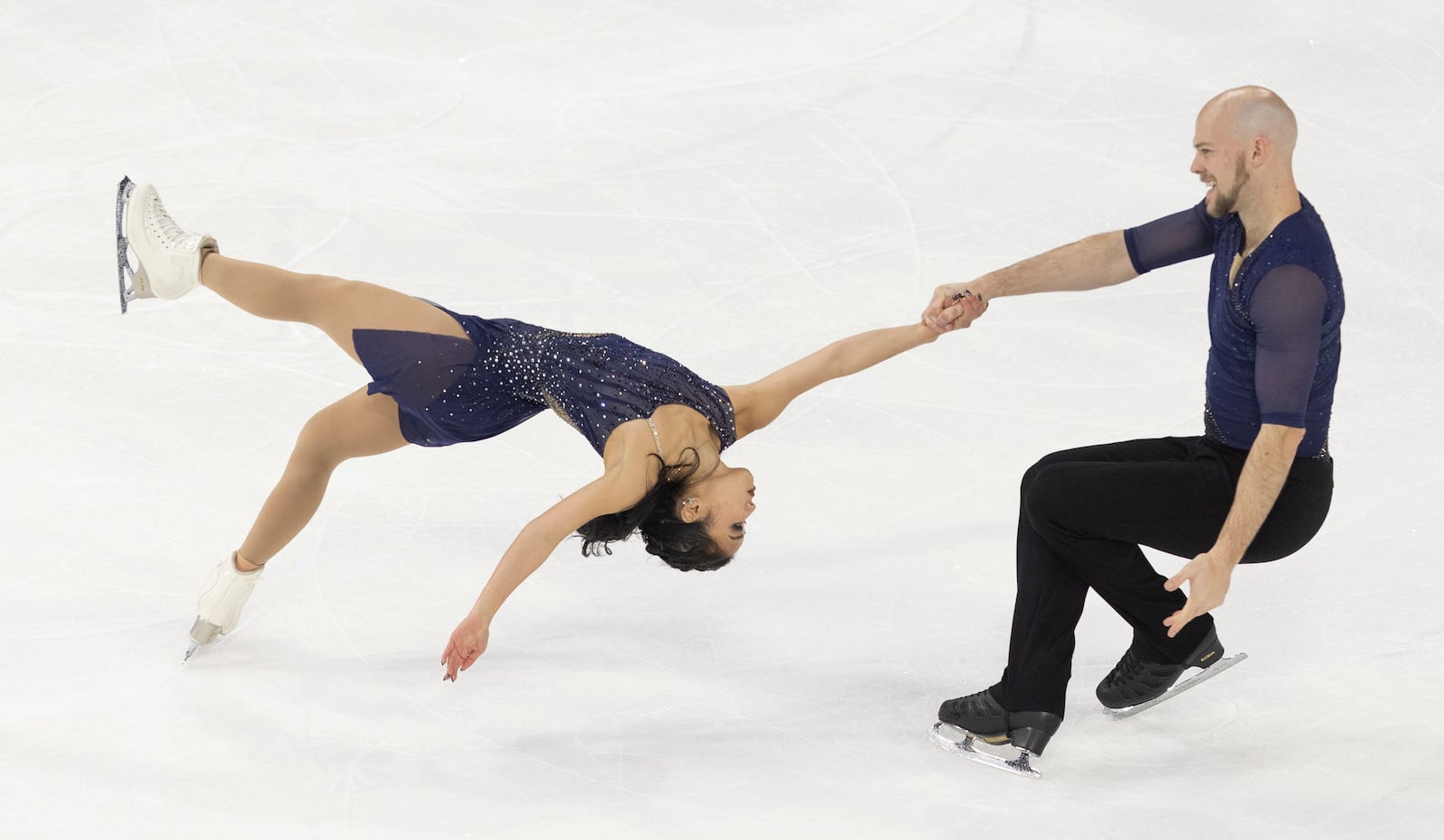 Ellie Kam and Danny O'Shea perform during the pairs short program at the U.S. figure skating championships Thursday, Jan. 23, 2025, in Wichita, Kan. (AP Photo/Travis Heying)