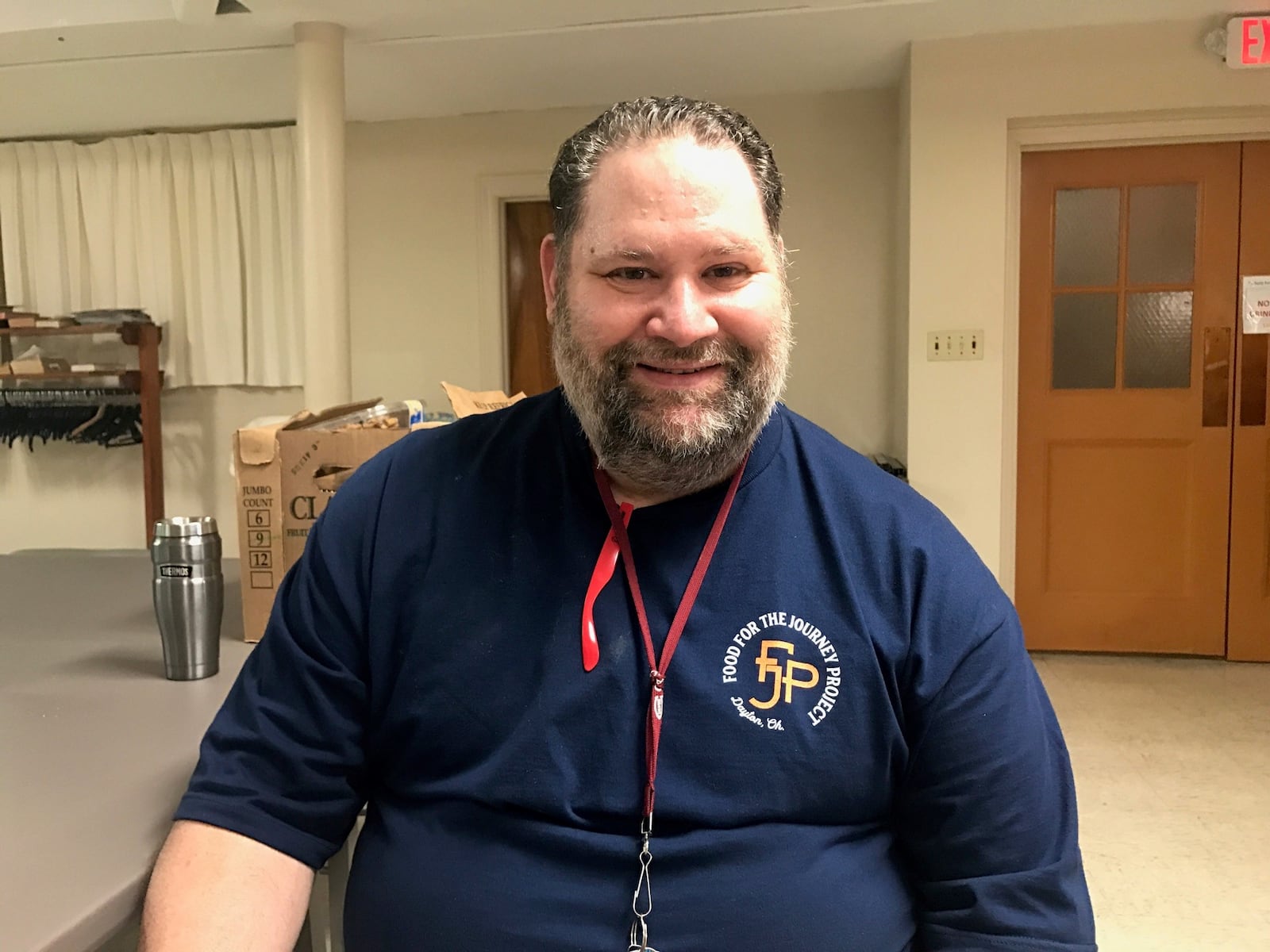 John “Sully” Sullivan at Food for the Journey Project lunch giveaway Friday at East Dayton Fellowship Church. (Photo by Tom Archdeacon)