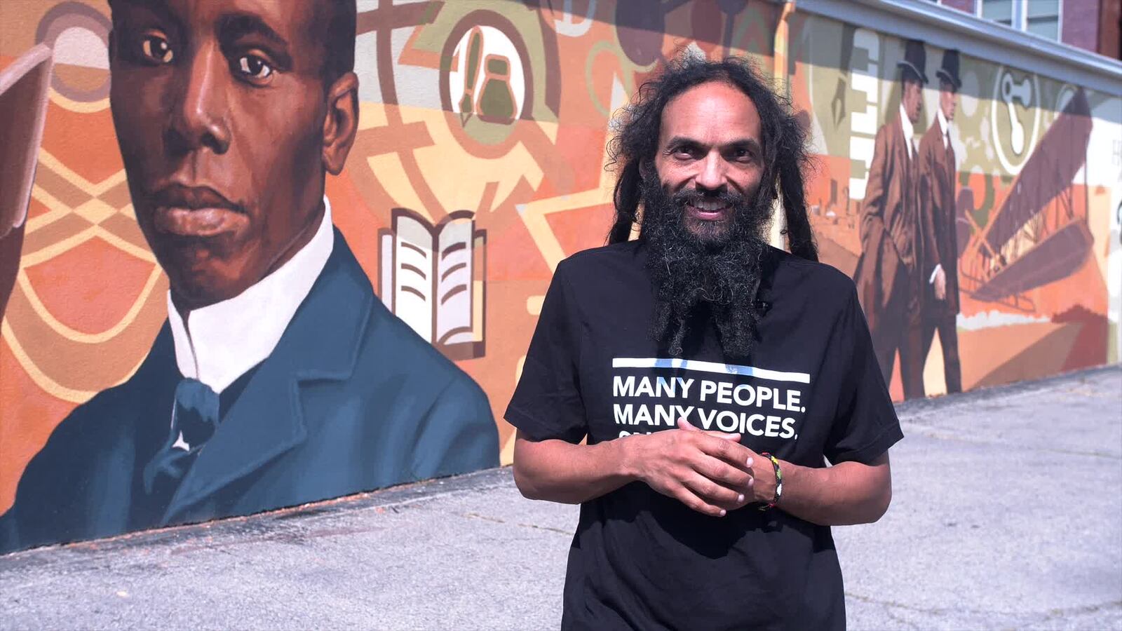 Amaha Sellassie  in the Human Relations Council's Many People. Many Voices. One City. T-shirt