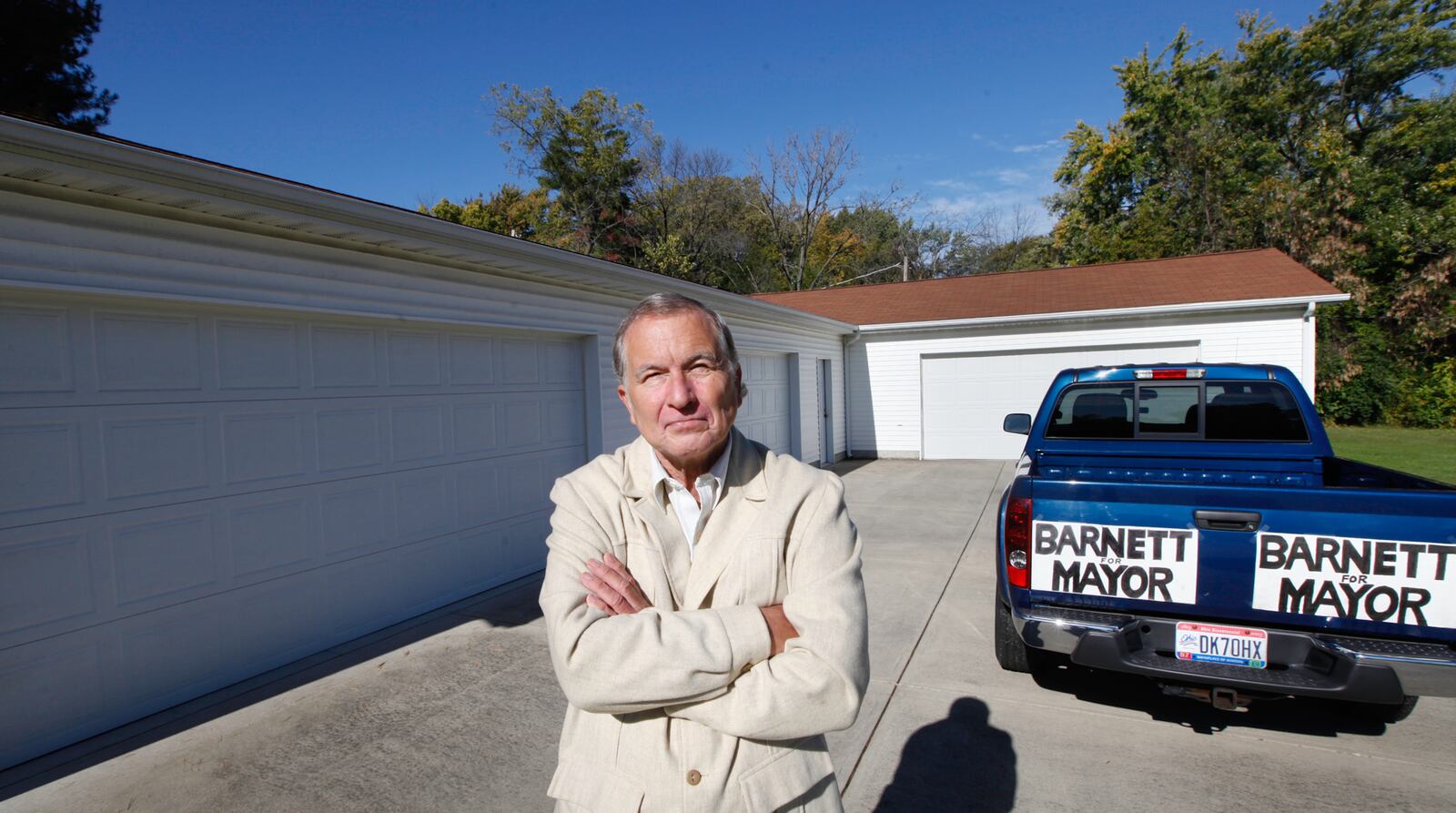 Michael Barnett got into the Kettering mayor's race partly because of a long-running building code dispute over a new garage he wanted to build onto his his existing house in addition to the large detached garage he already has to store part of a classic Corvette collection. CHRIS STEWART / STAFF