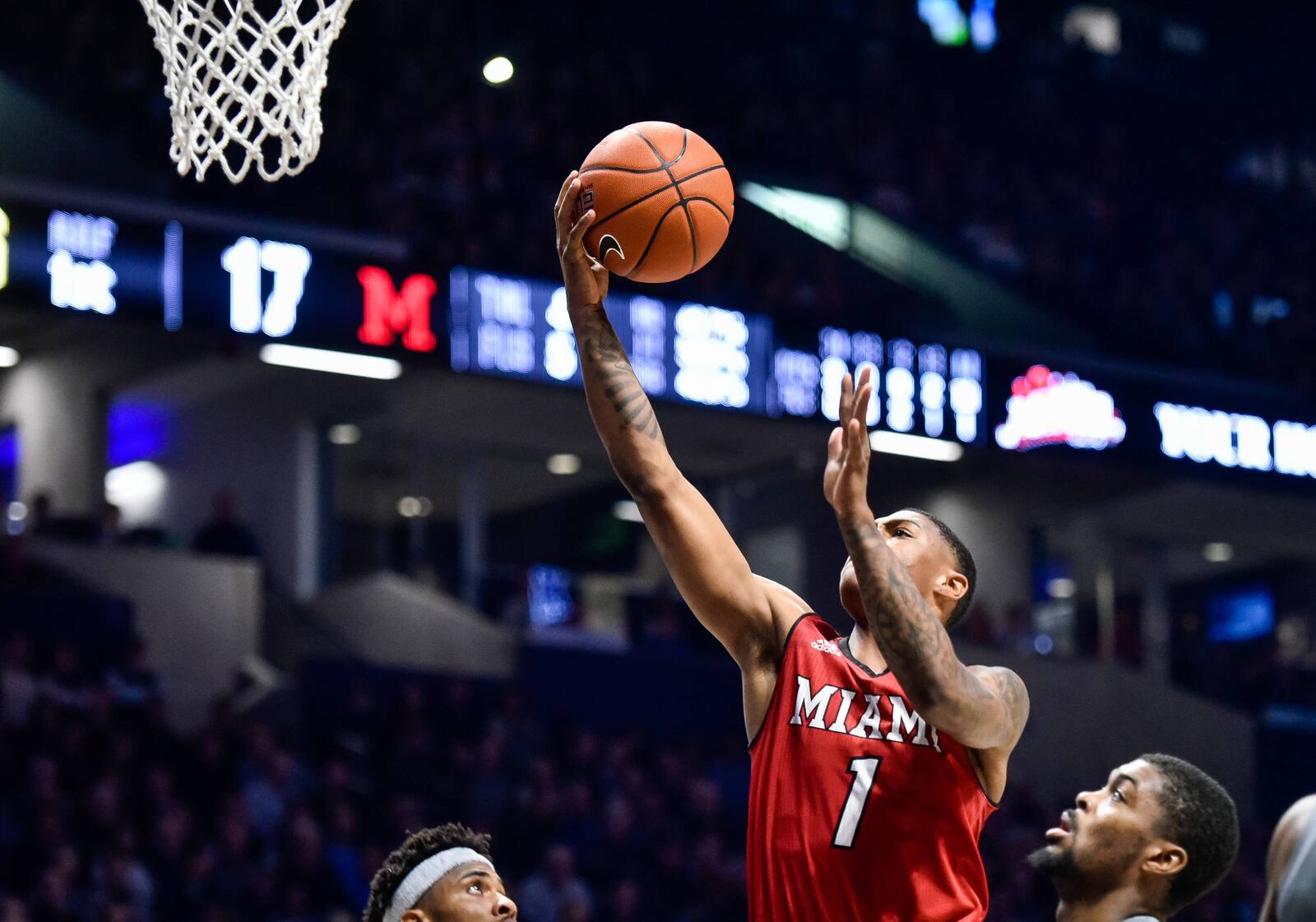 Miami's Nike Sibande goes up to the basket during their basketball game against Xavier Wednesday, Nov. 28 at Xavier's Cintas Center in Cincinnati. Xavier won 82-55. NICK GRAHAM/STAFF