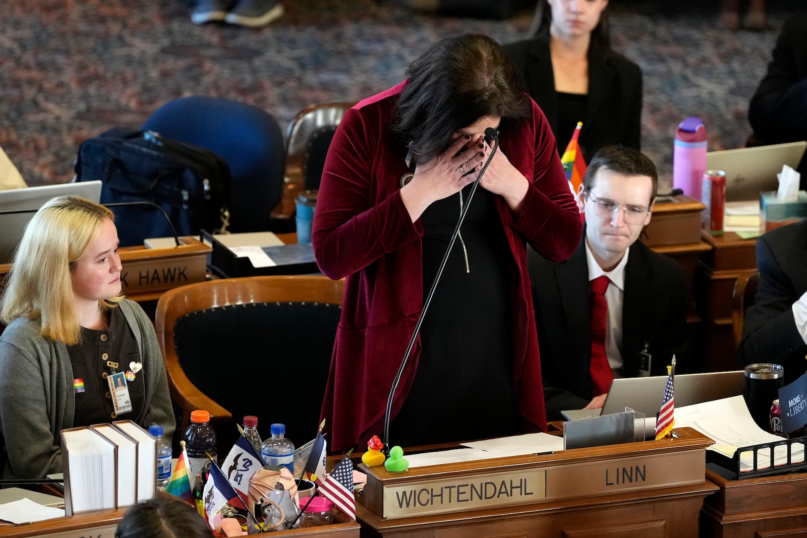 Rep. Aime Wichtendahl, D-Hiawatha, reacts after speaking during debate on the gender identity bill, Thursday, Feb. 27, 2025, at the Statehouse in Des Moines, Iowa. (AP Photo/Charlie Neibergall)